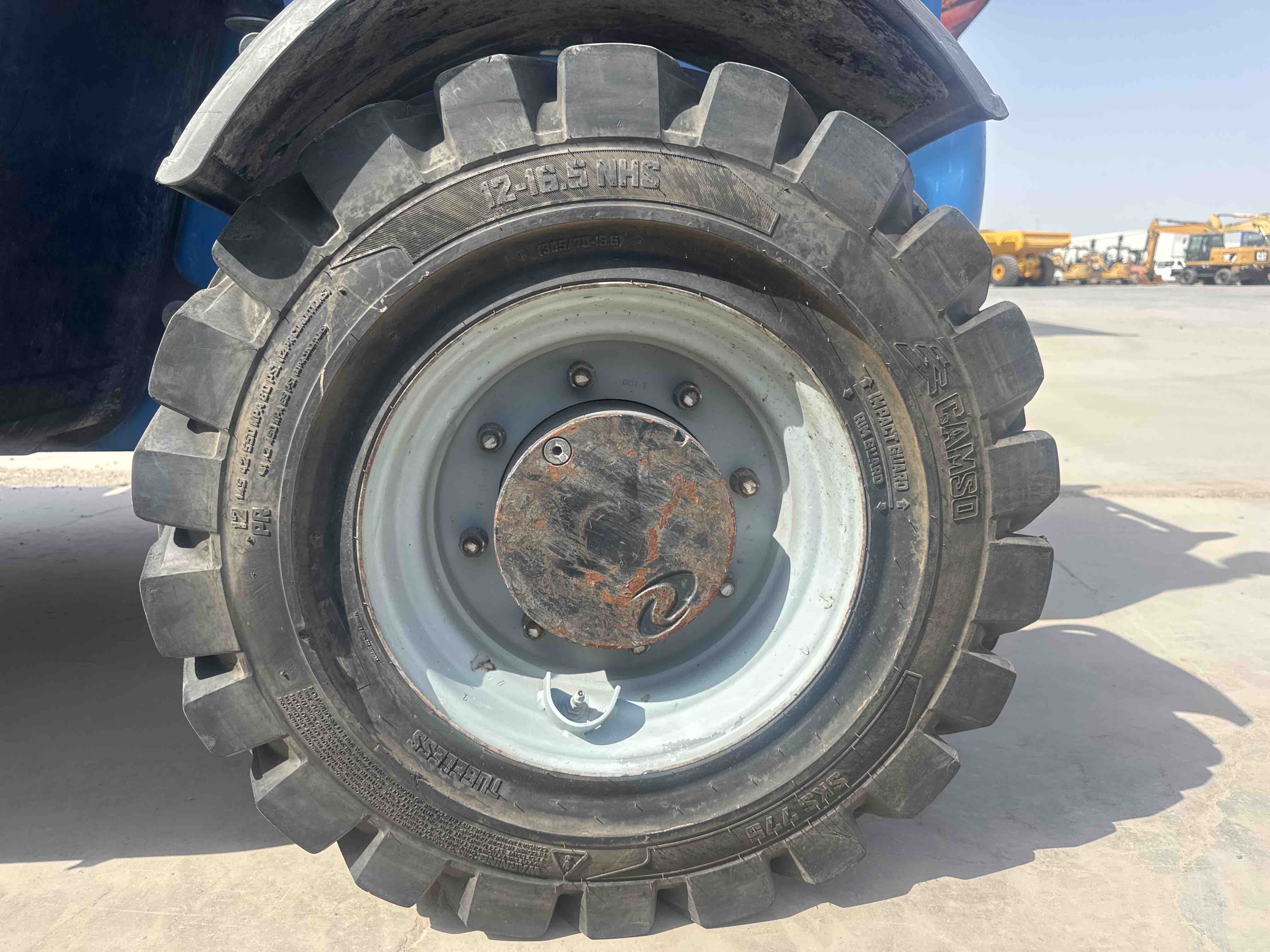 THM-004-جيني-GTH-5519-رافعات-تلسكوبية-فحص-الهيكل-الإطار-الخلفي-الأيسر-/-محور-العجلة---الحالة-1