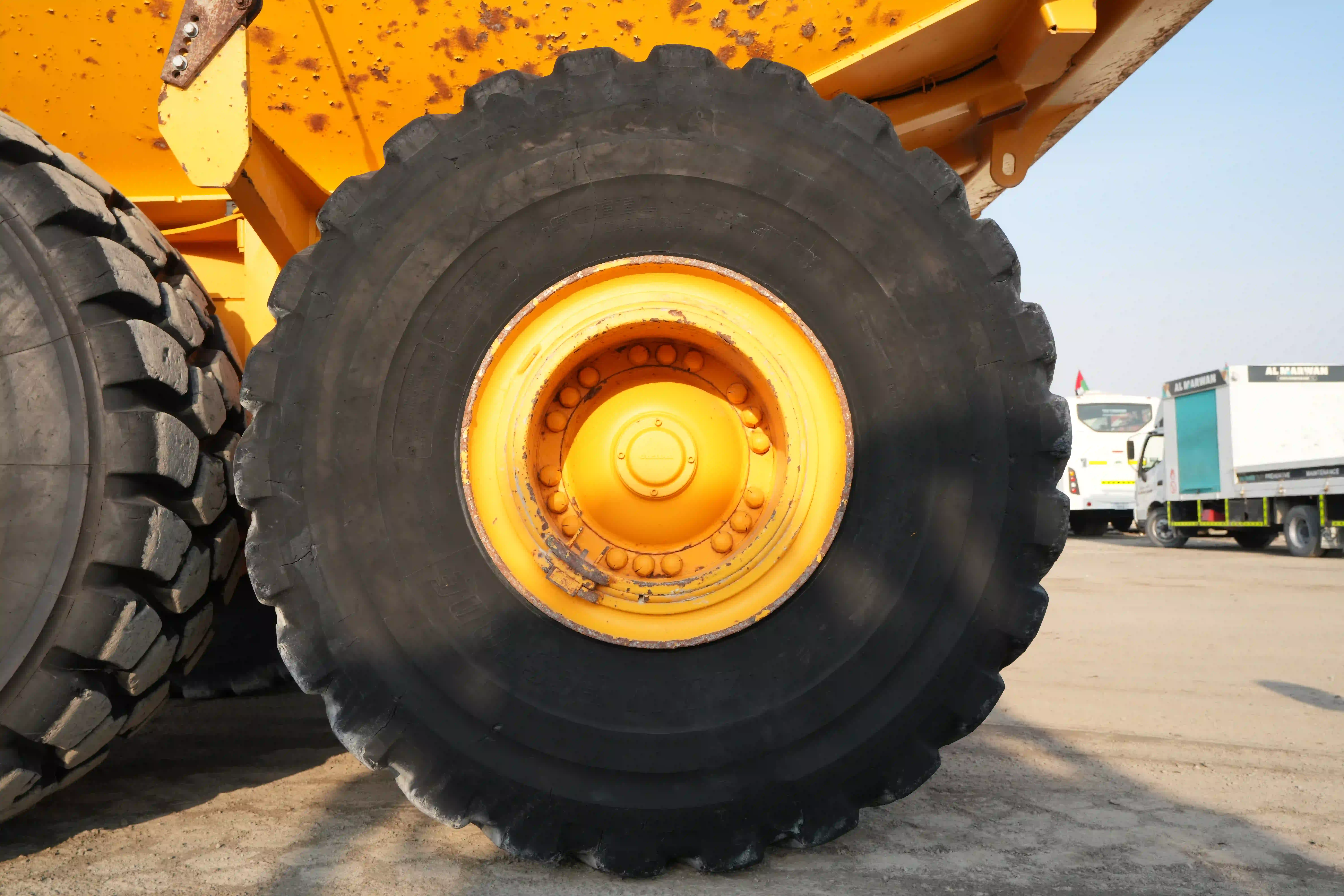 ADT-003-Volvo-A40G-articulated-dump-truck-inspection-chassis-left-rear-tire-wheel-hub-condition-1