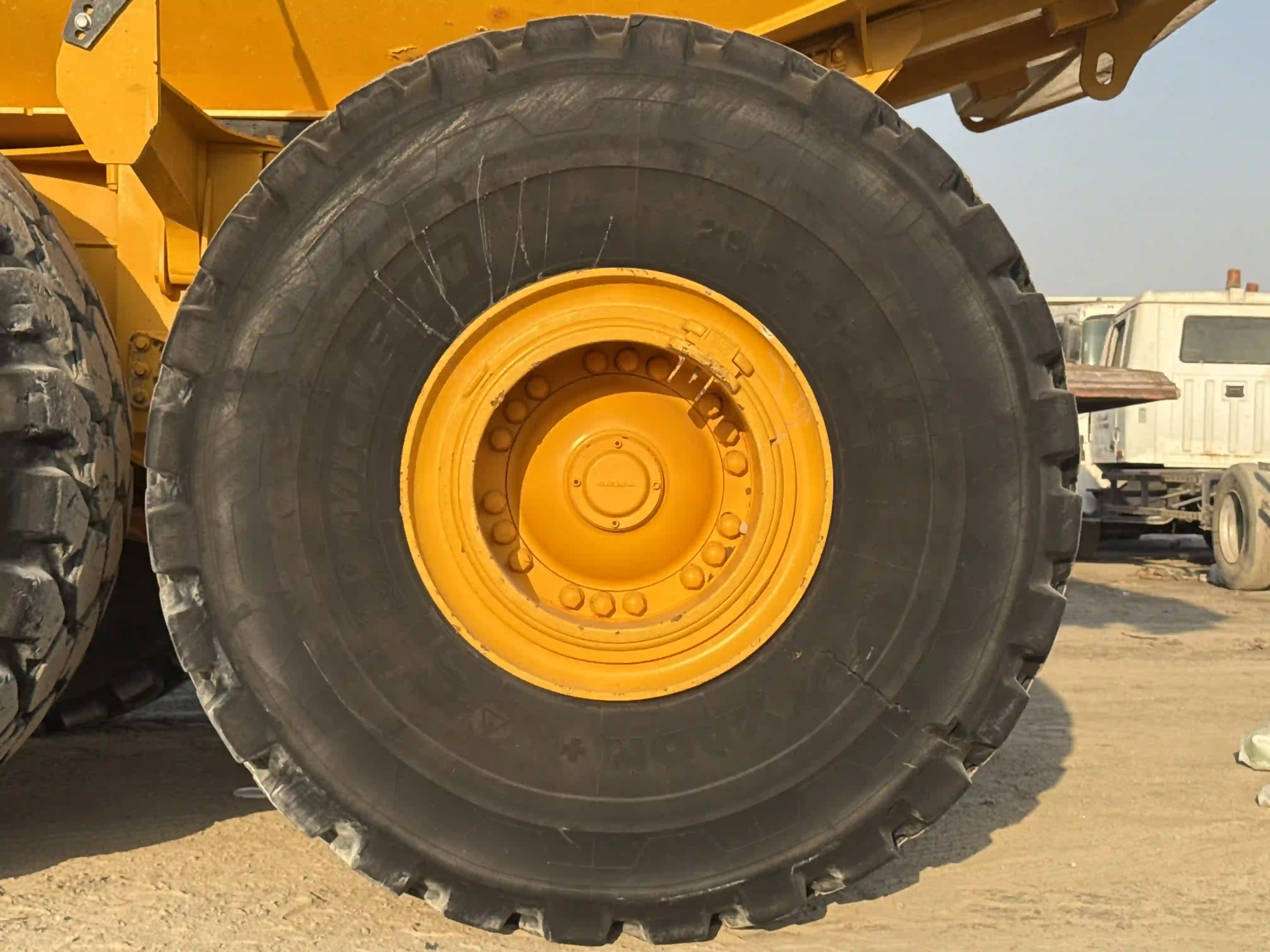 ADT-002-Volvo-A40G-articulated-dump-truck-inspection-chassis-left-rear-tire-wheel-hub-condition-3