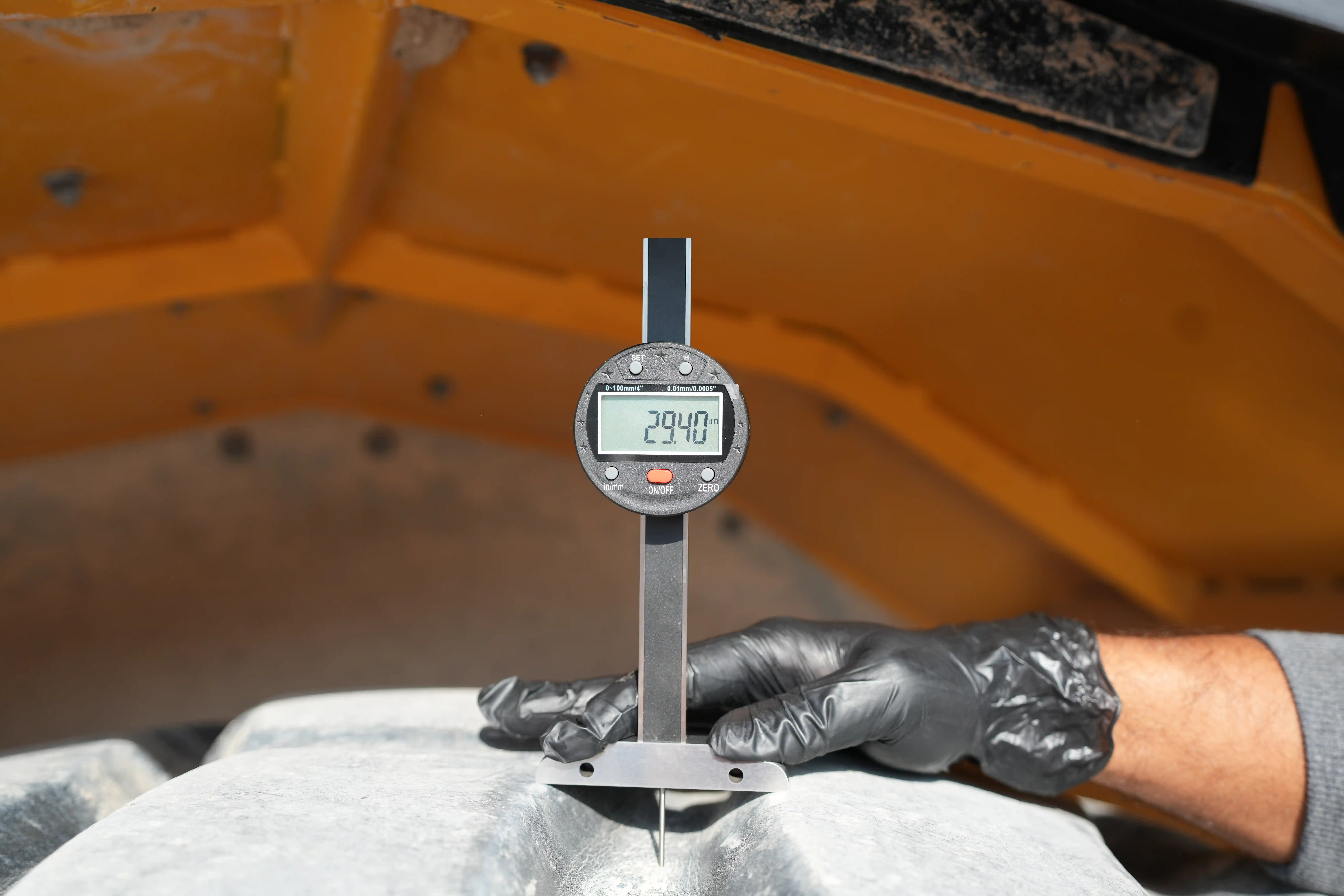 ADT-001-Volvo-A40G-articulated-dump-truck-inspection-chassis-left-front-tire-tread-depth