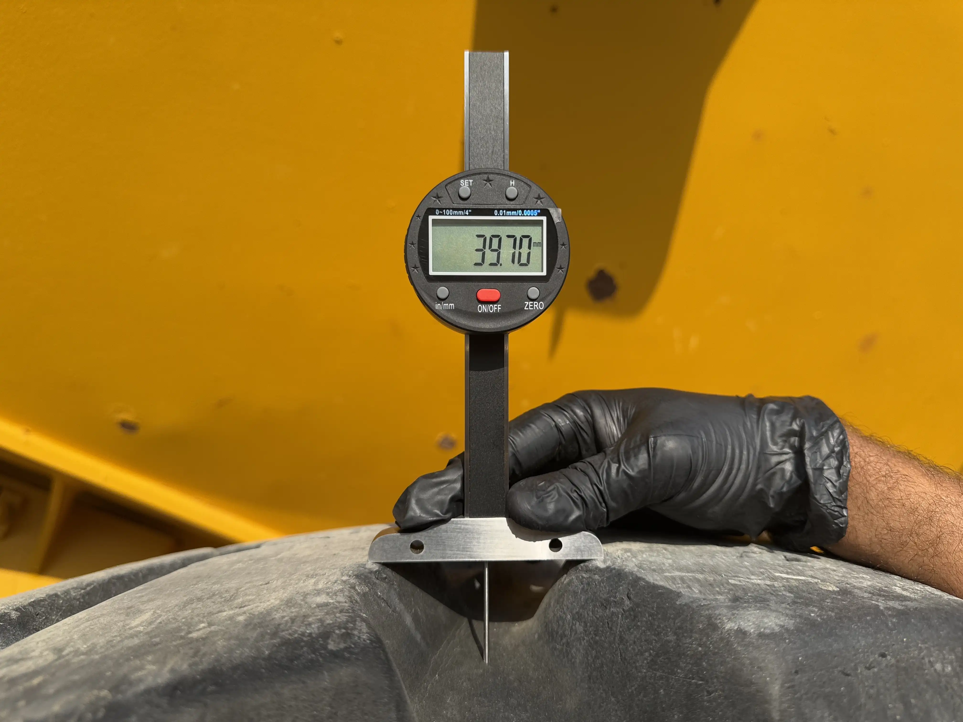 ADT-002-Volvo-A40G-articulated-dump-truck-inspection-chassis-right-rear-tire-tread-depth