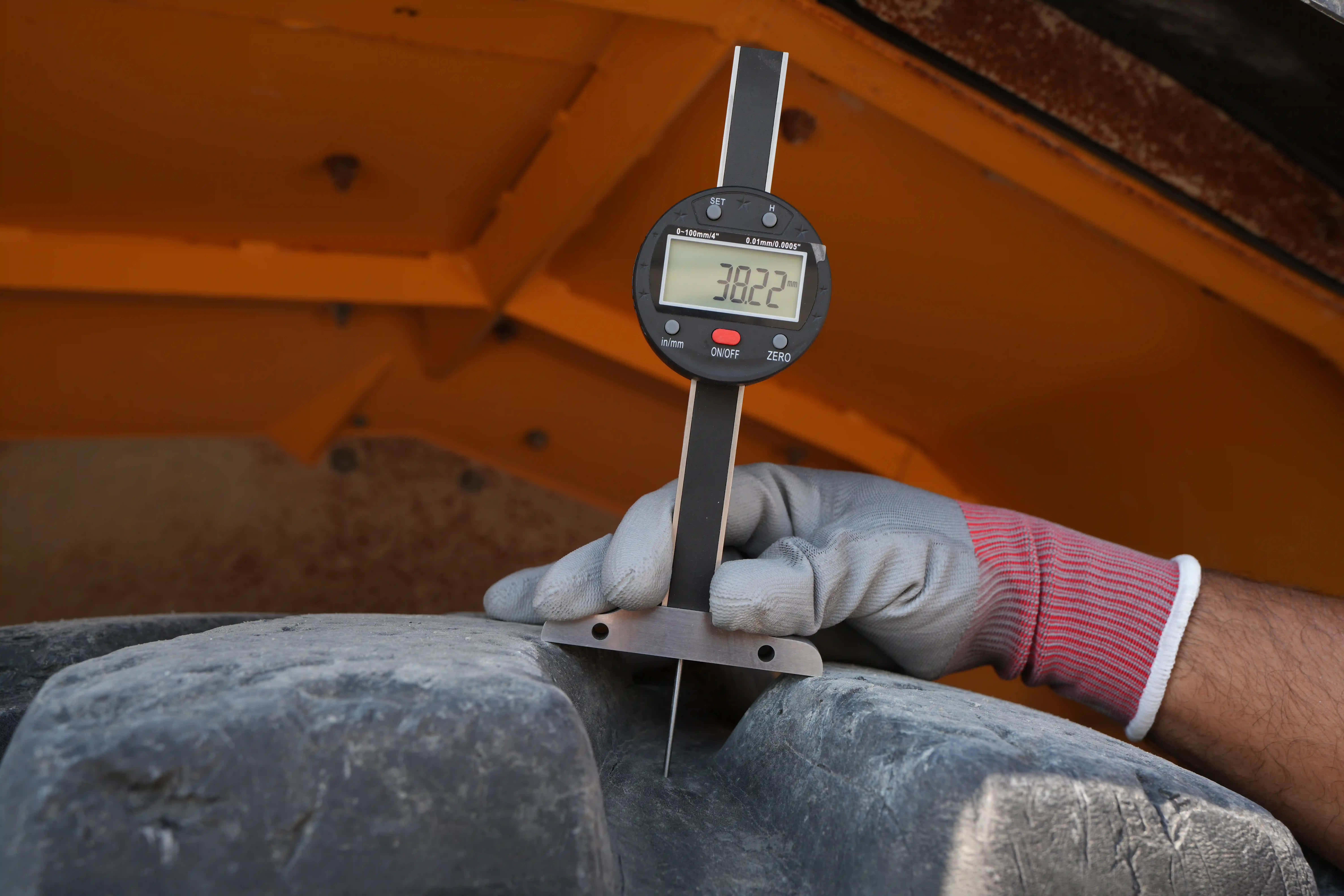 ADT-003-Volvo-A40G-articulated-dump-truck-inspection-chassis-left-front-tire-tread-depth