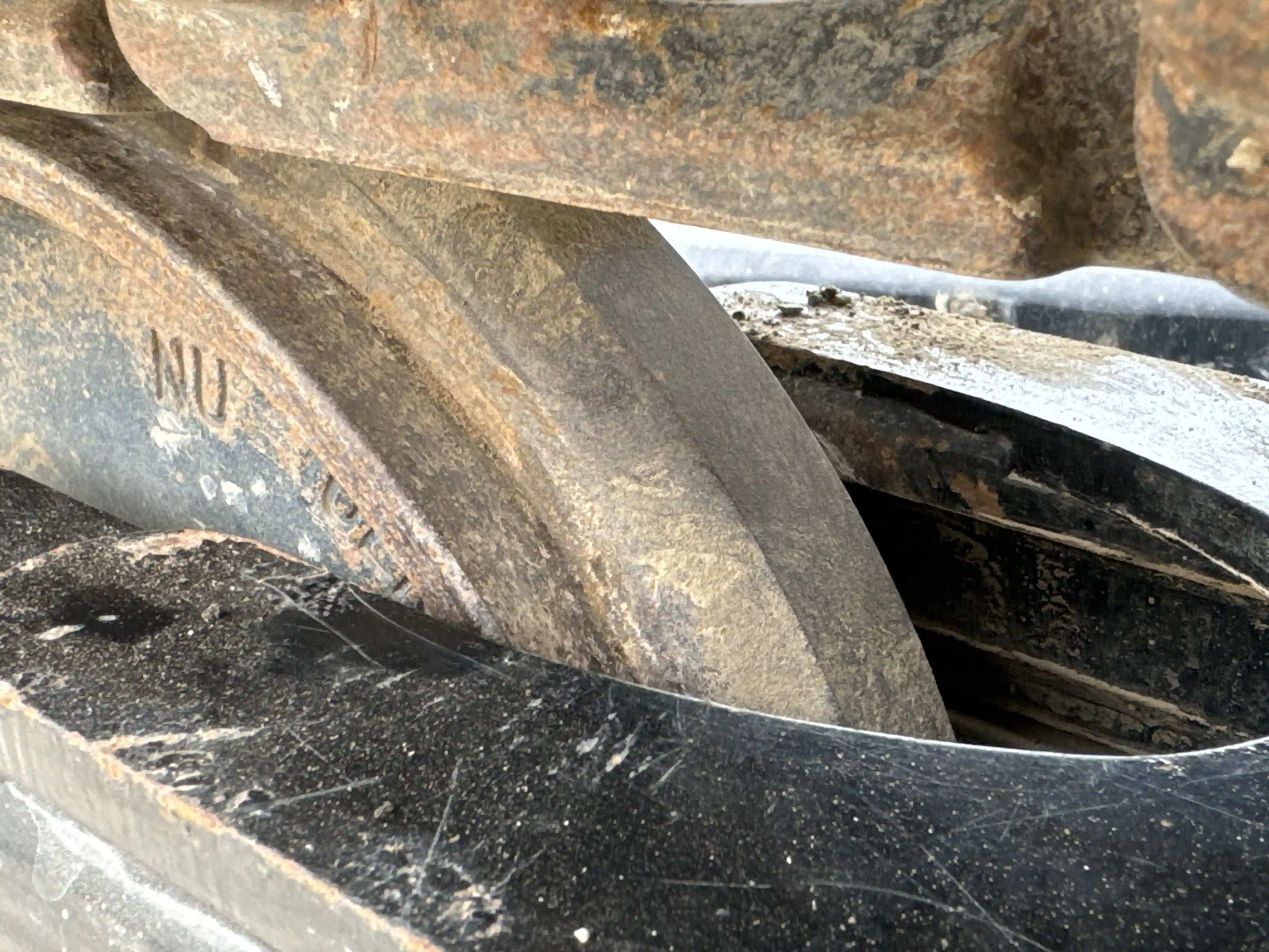 MNX-003-Cat-305.5E2-mini-excavator-inspection-undercarriage-left-idler-1