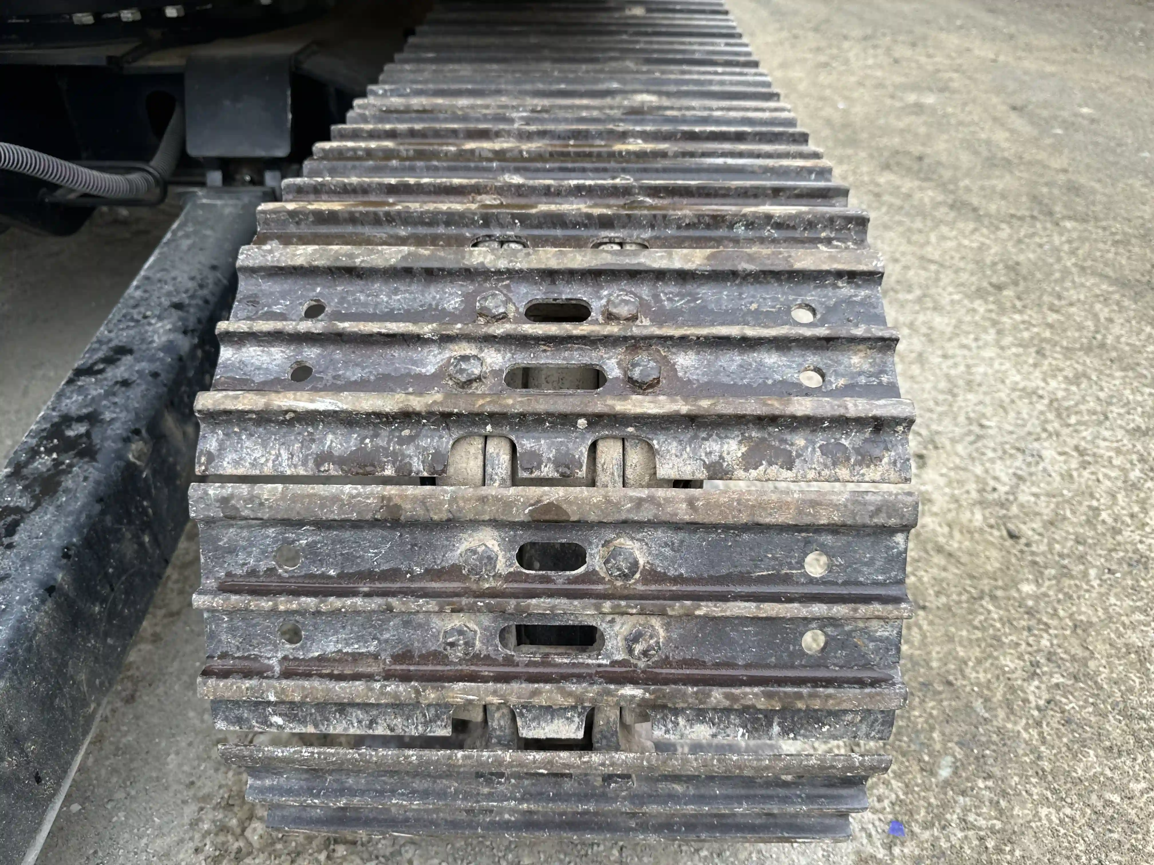 MNX-003-Cat-305.5E2-mini-excavator-inspection-undercarriage-left-track-shoes-2