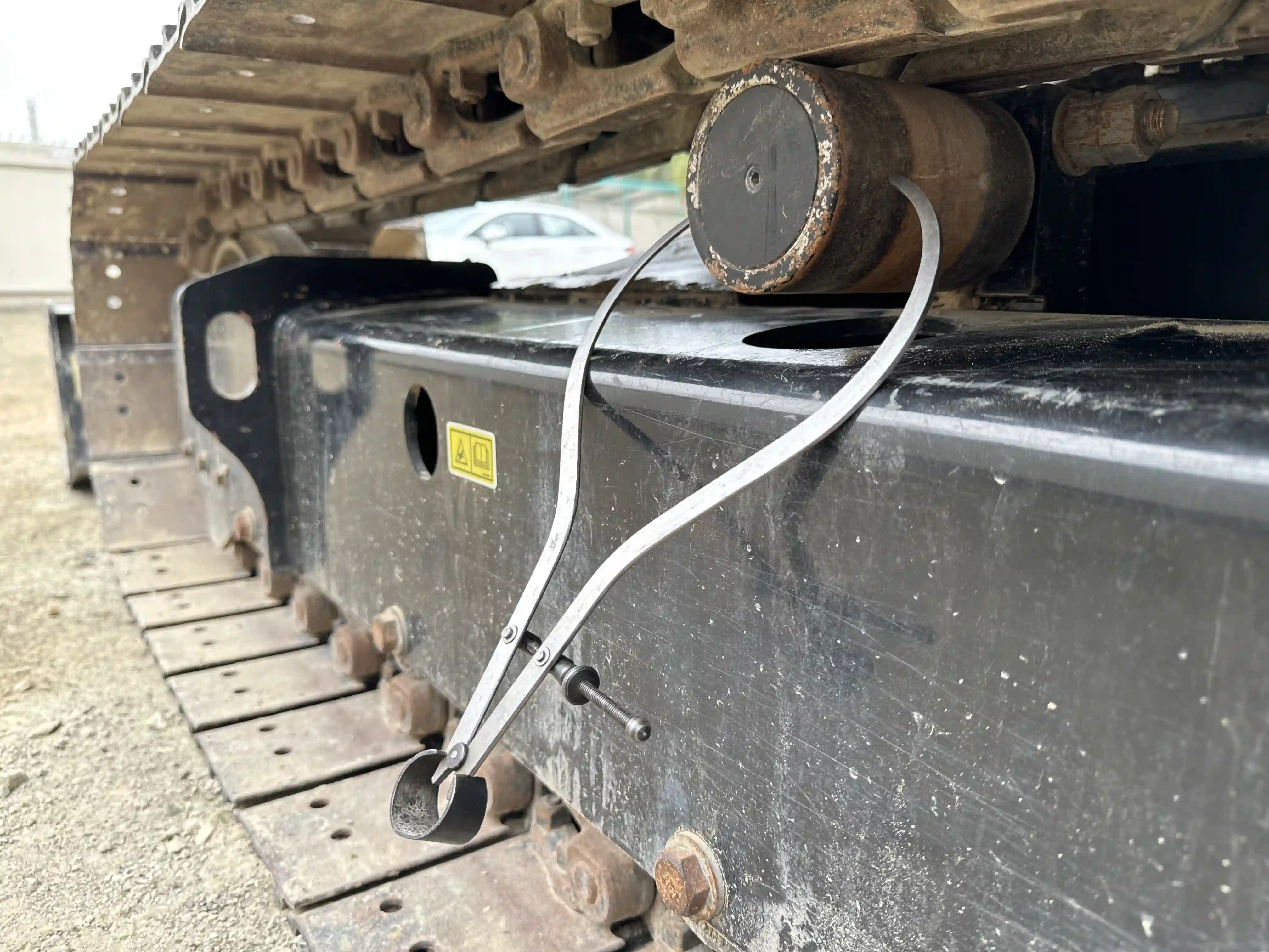 MNX-003-Cat-305.5E2-mini-excavator-inspection-undercarriage-left-carrier-rollers-3