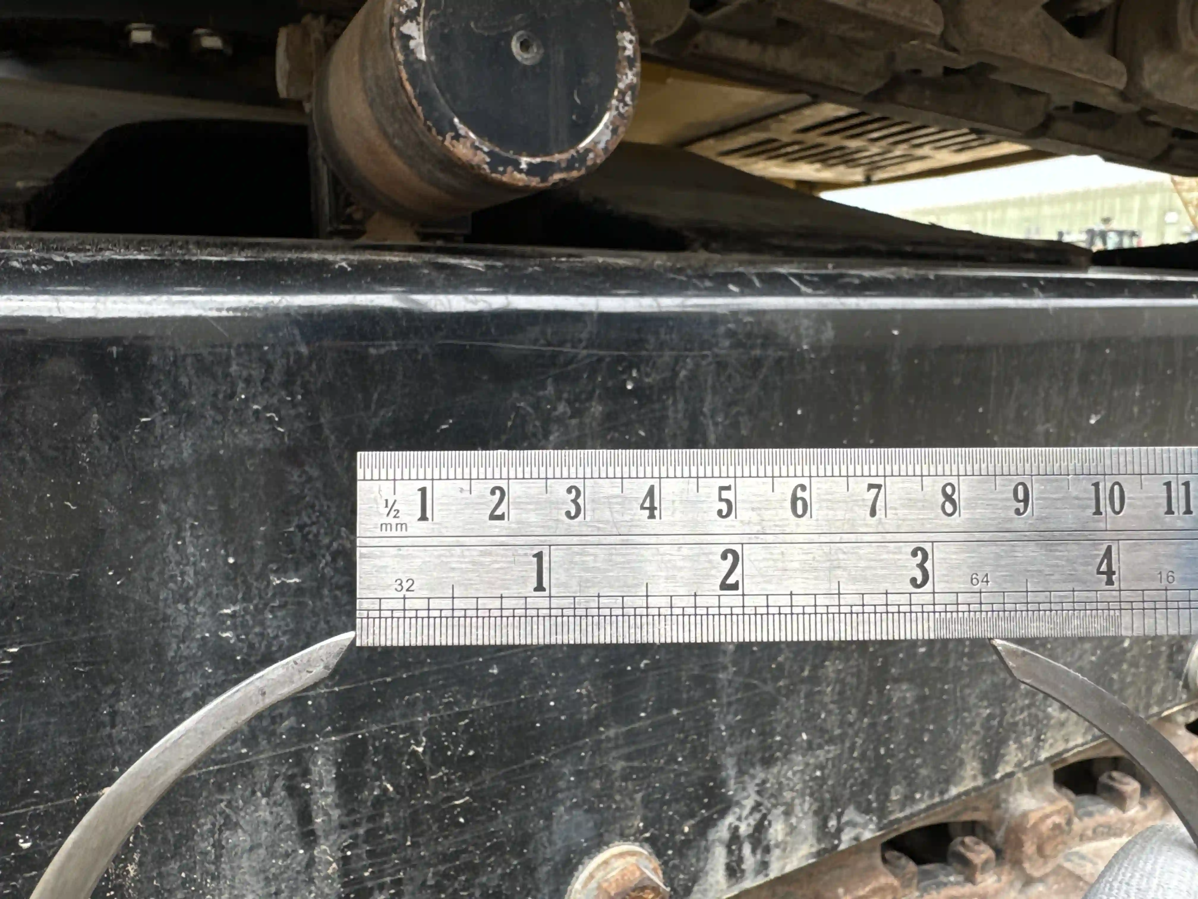 MNX-003-Cat-305.5E2-mini-excavator-inspection-undercarriage-left-carrier-rollers-4