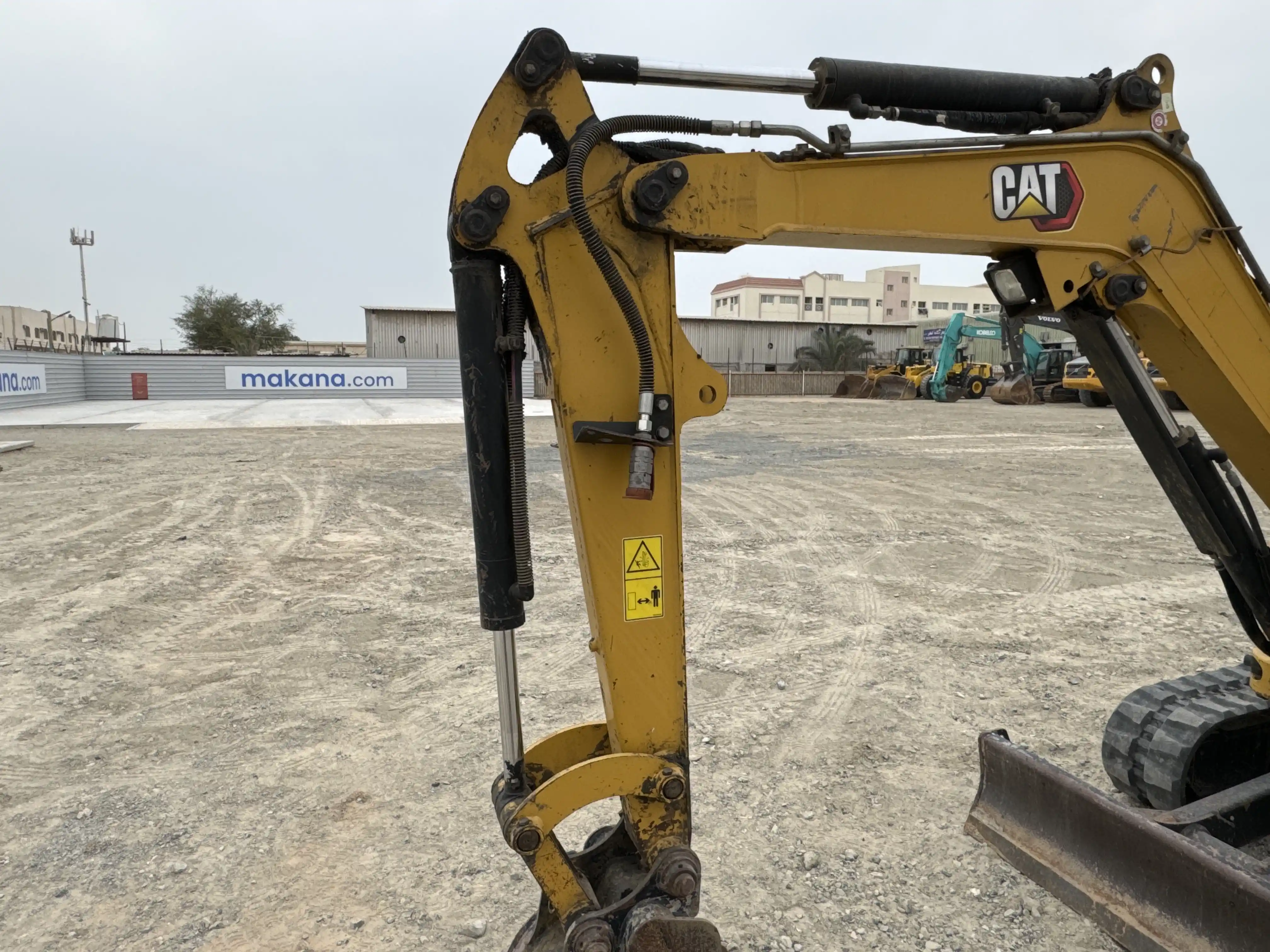 MNX-002-Cat-303E-mini-excavator-inspection-chassis-stick-1