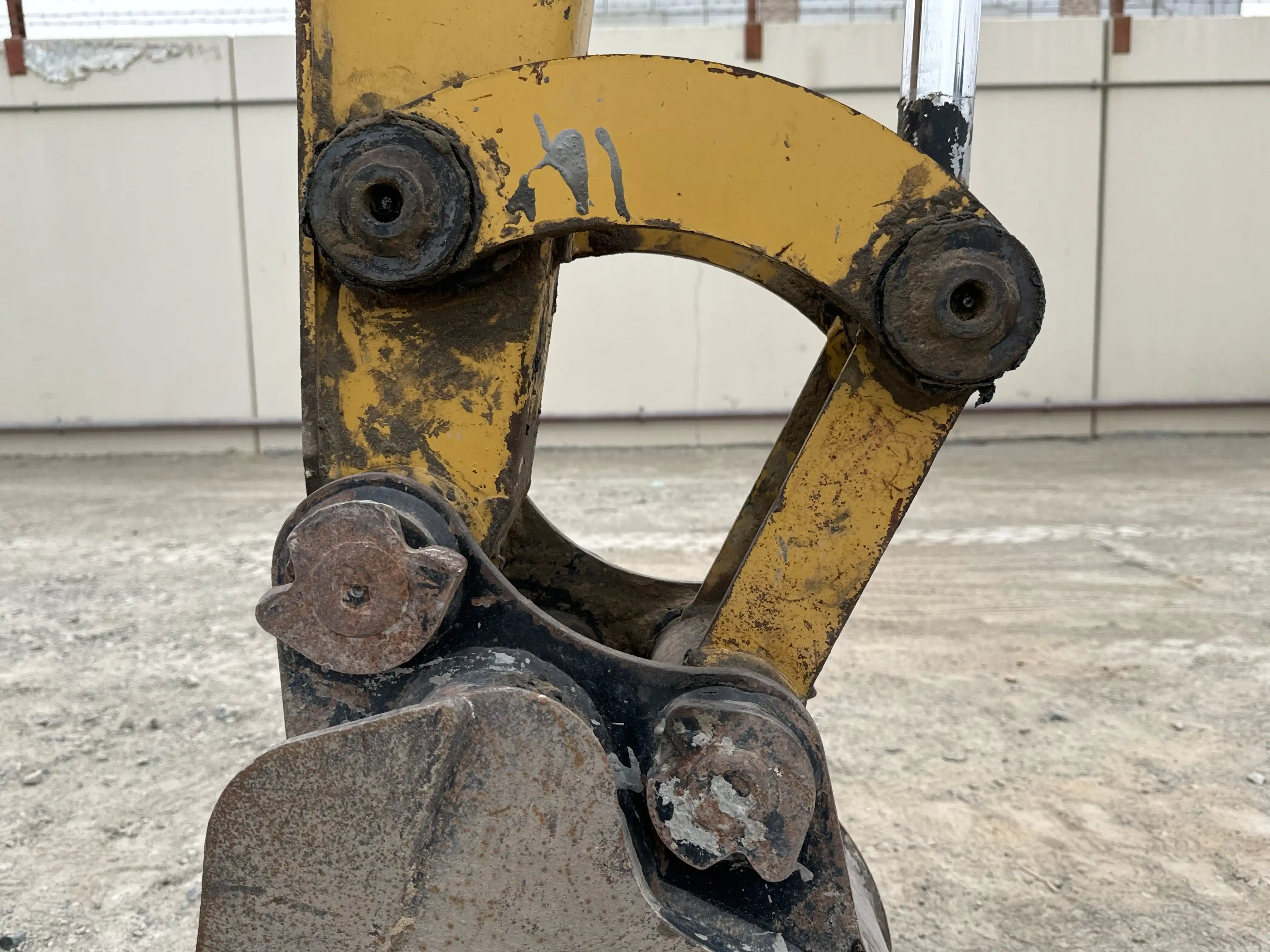 MNX-002-Cat-303E-mini-excavator-inspection-chassis-pin-and-bushings-stick-to-bucket-2