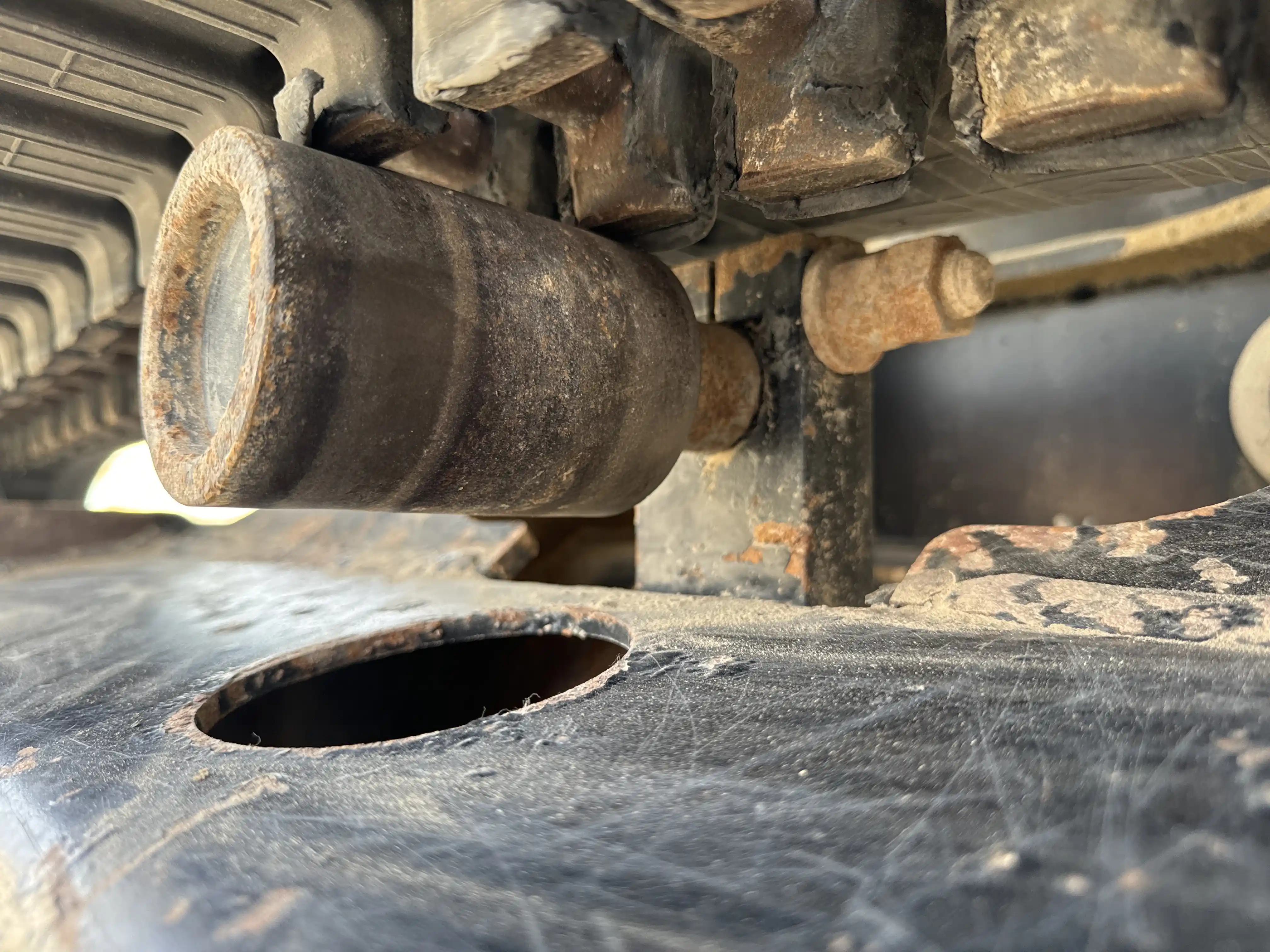 MNX-002-Cat-303E-mini-excavator-inspection-undercarriage-left-carrier-rollers-2