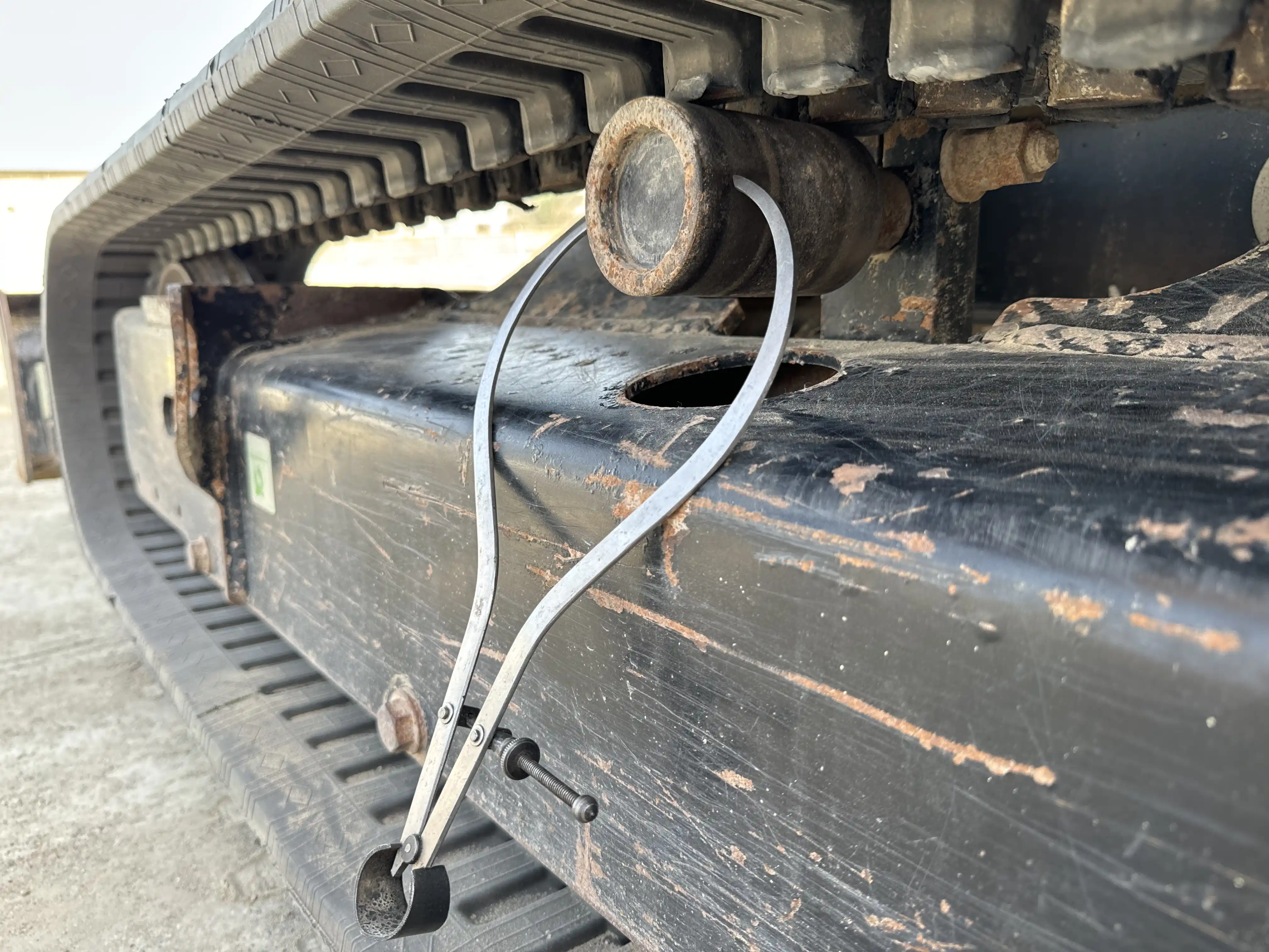 MNX-002-Cat-303E-mini-excavator-inspection-undercarriage-left-carrier-rollers-3