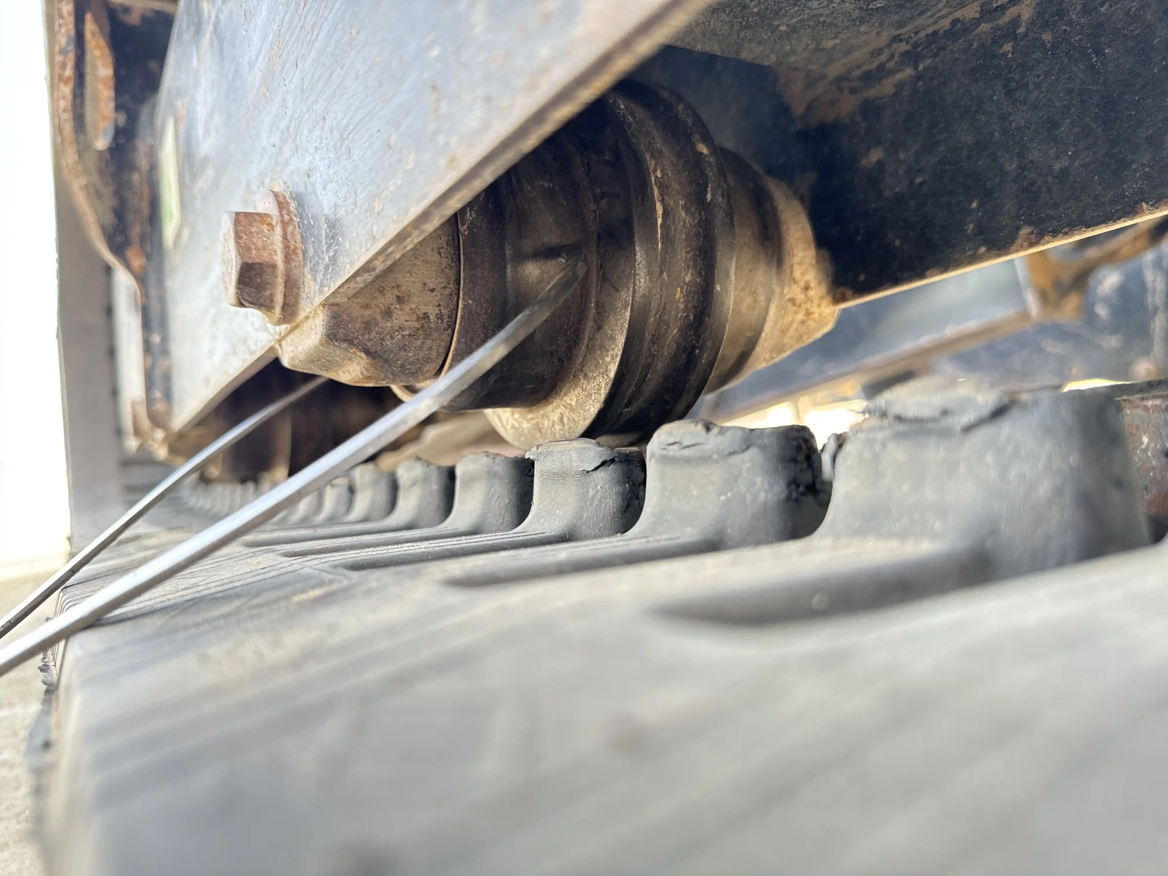MNX-002-Cat-303E-mini-excavator-inspection-undercarriage-left-track-rollers-3