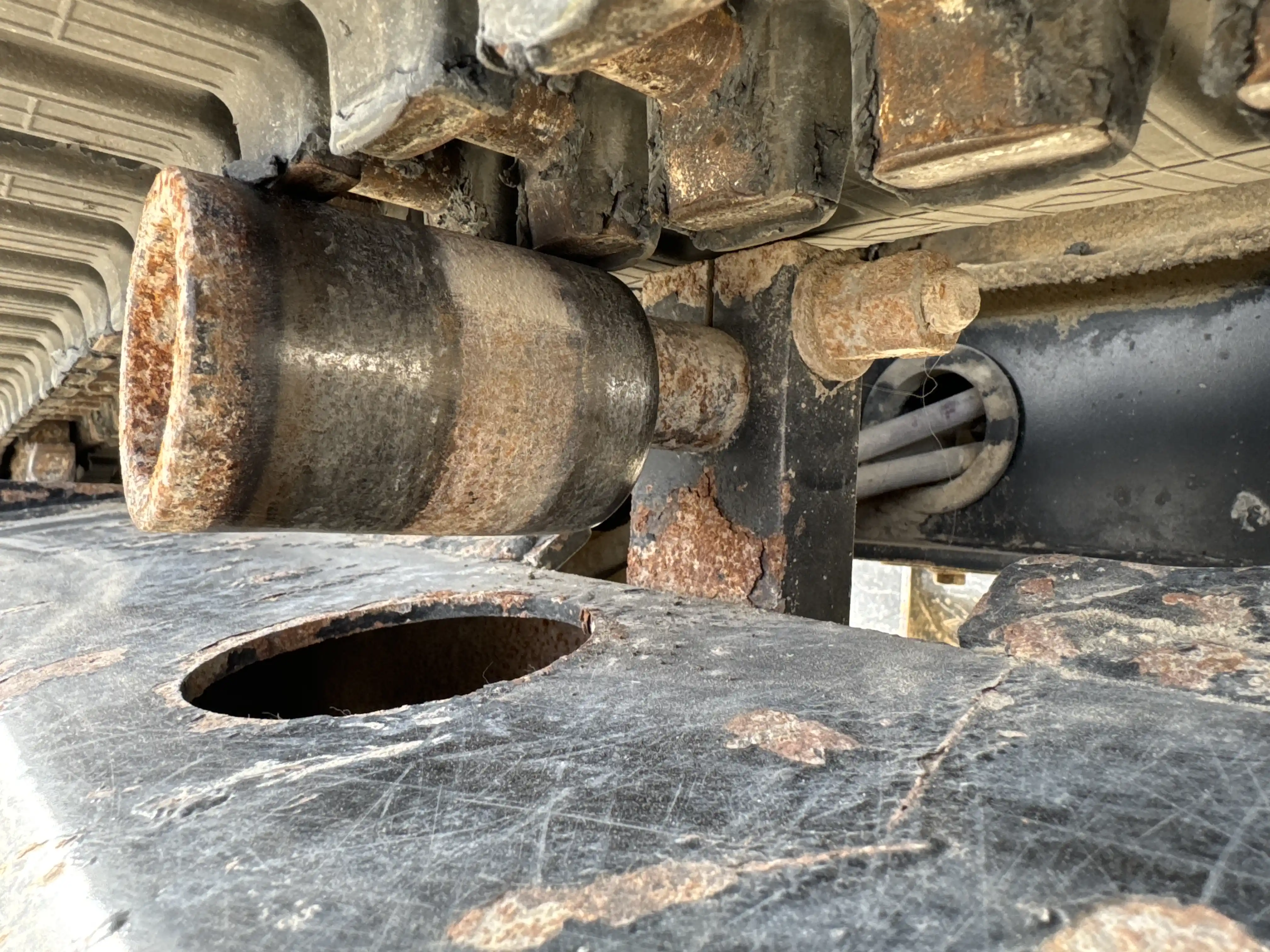 MNX-002-Cat-303E-mini-excavator-inspection-undercarriage-right-carrier-rollers-1