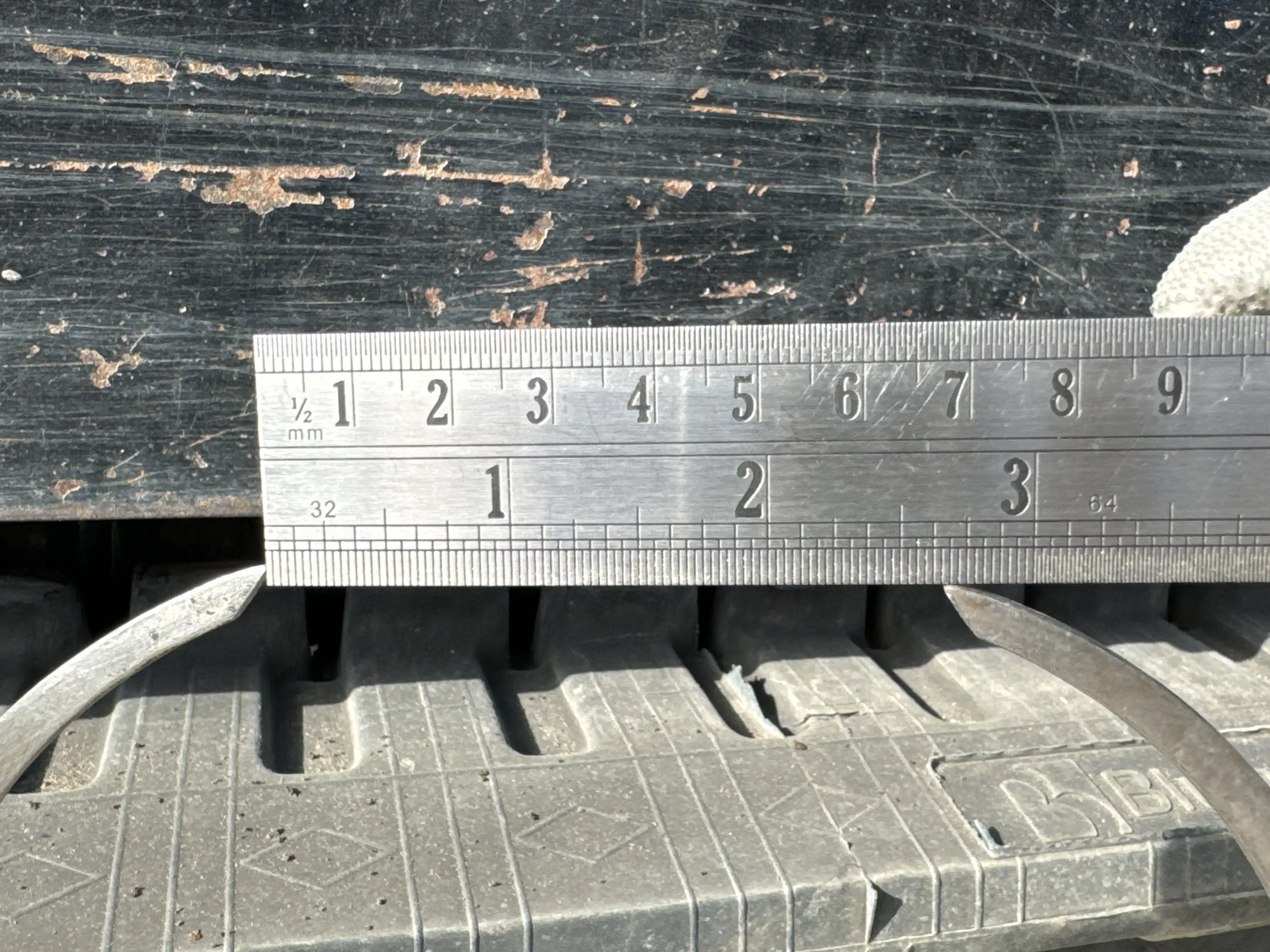 MNX-002-Cat-303E-mini-excavator-inspection-undercarriage-right-carrier-rollers-3