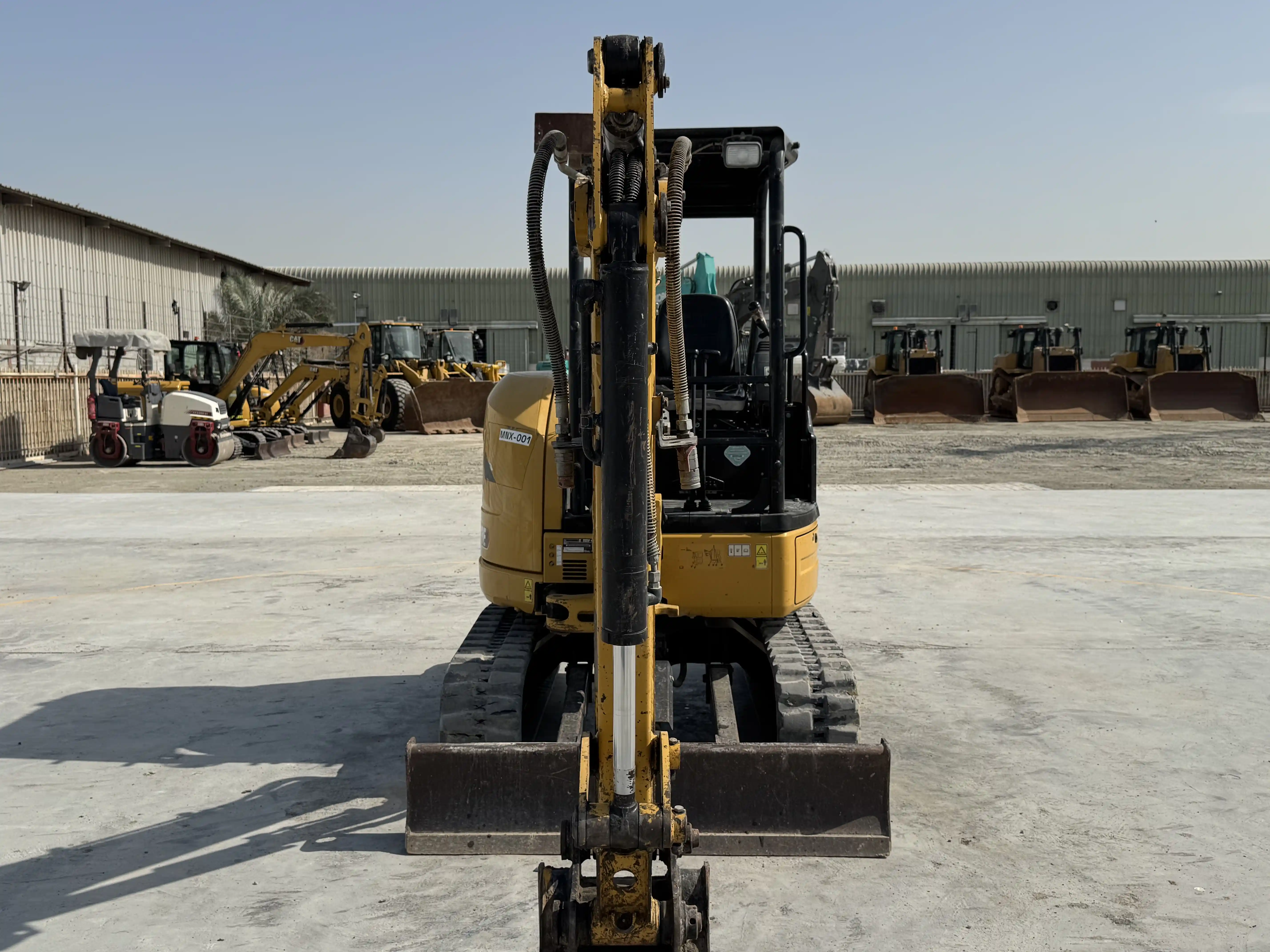MNX-001-Cat-303E-mini-excavator-inspection-chassis-stick-3