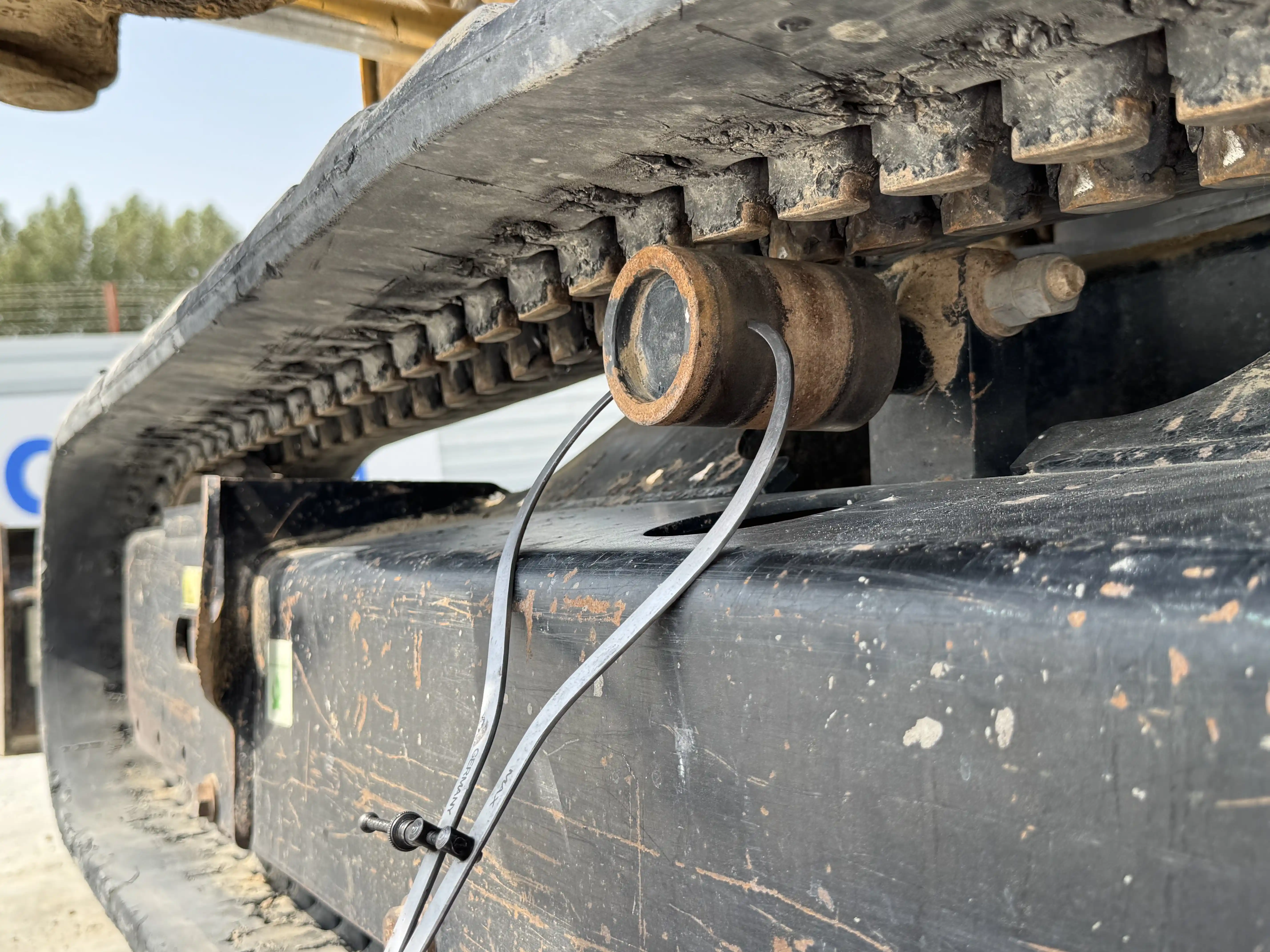 MNX-001-Cat-303E-mini-excavator-inspection-undercarriage-left-carrier-rollers-1