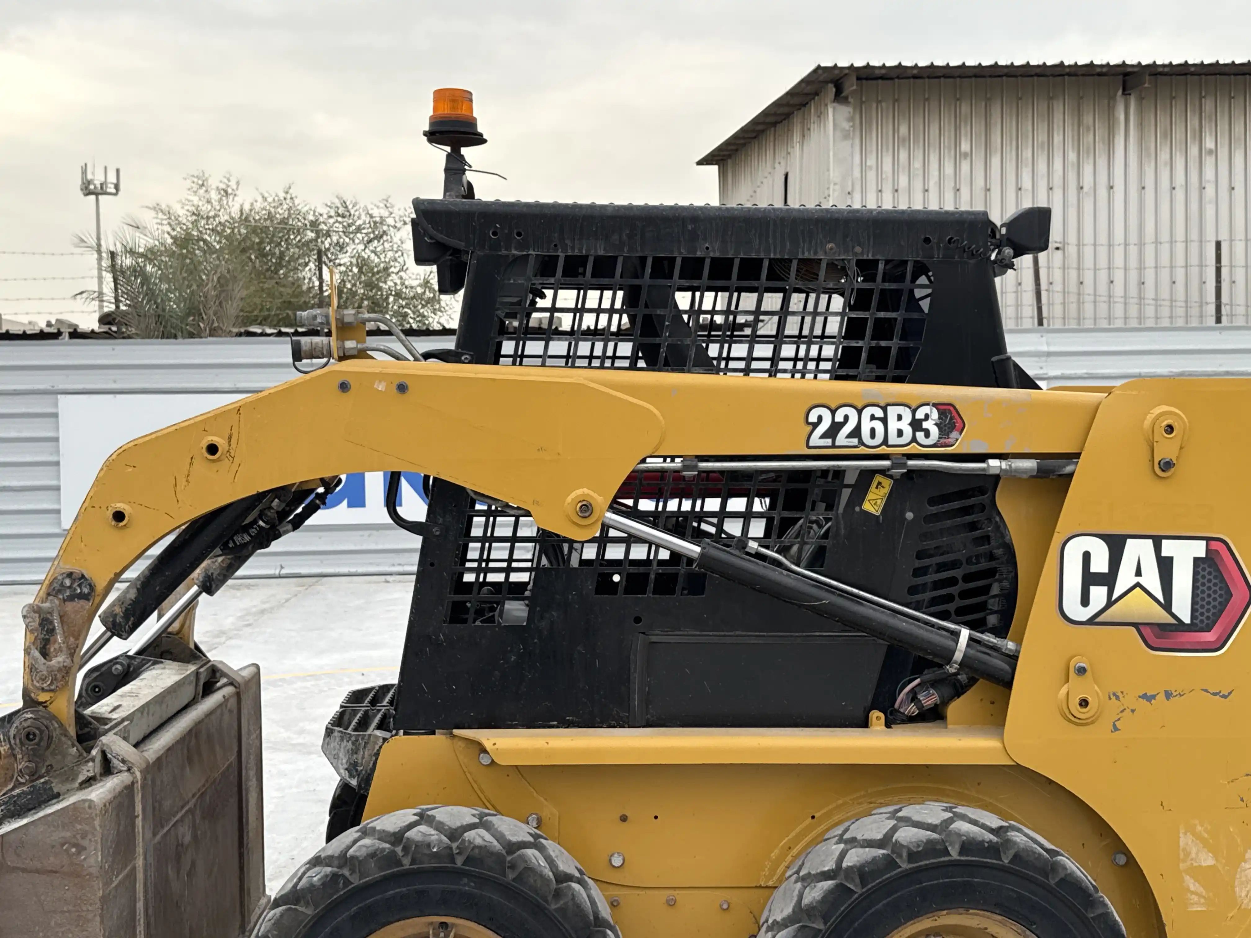SSL-003-Cat-226B3-skid-steer-loader-inspection-hydraulics-lift-arm-1