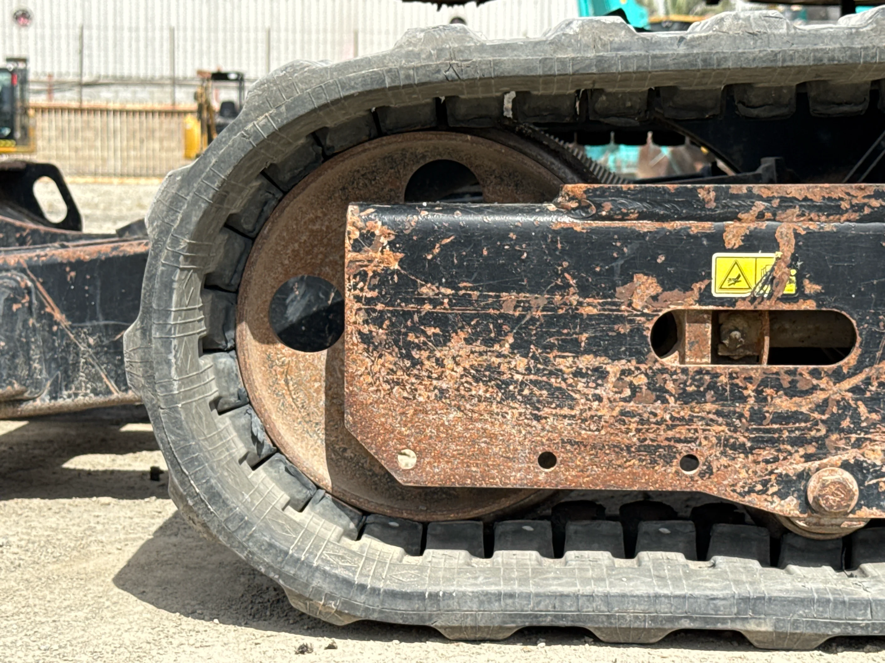 MNX-004-Cat-303E-mini-excavator-inspection-undercarriage-left-idler-1
