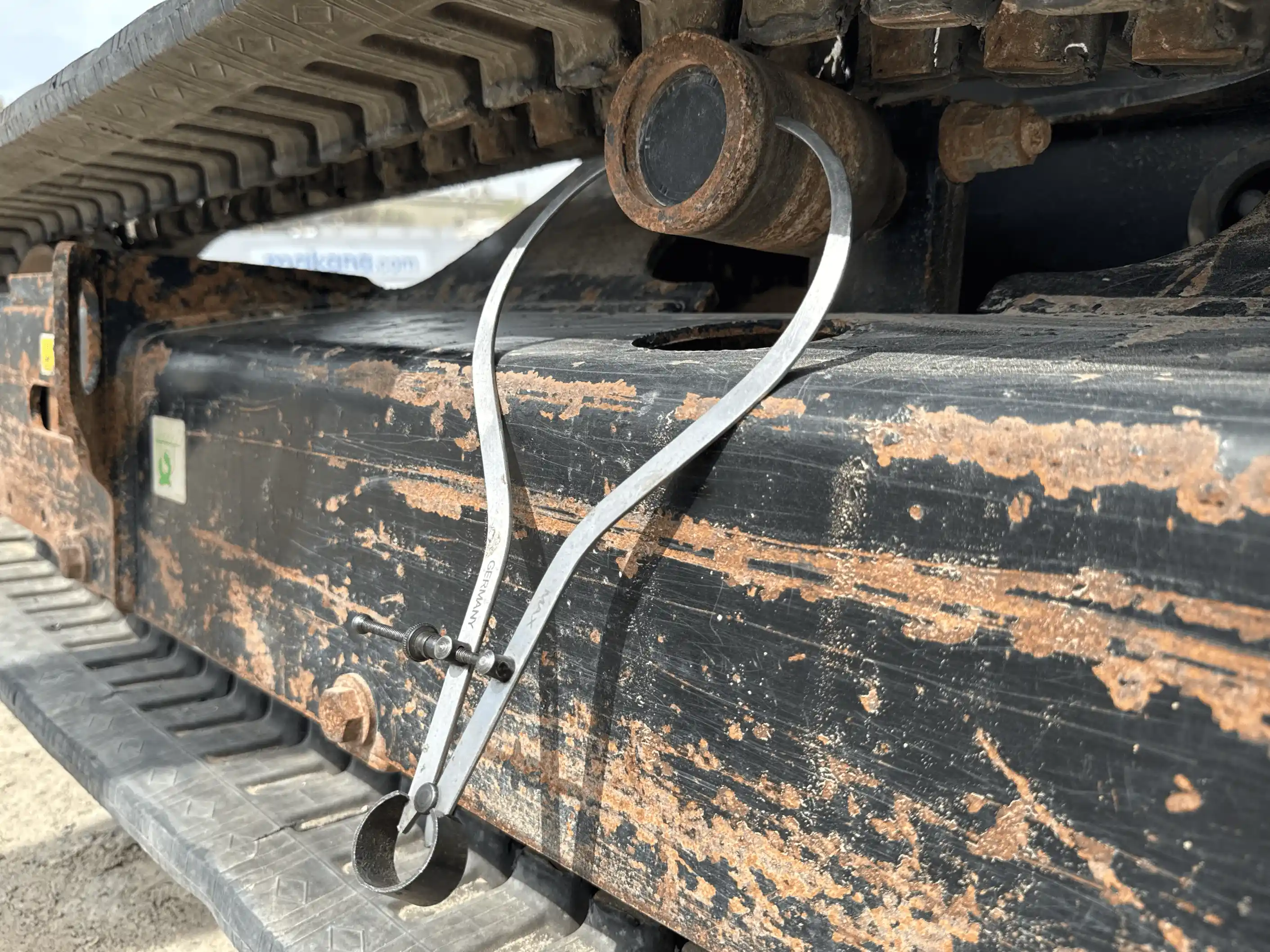 MNX-004-Cat-303E-mini-excavator-inspection-undercarriage-left-carrier-rollers-2