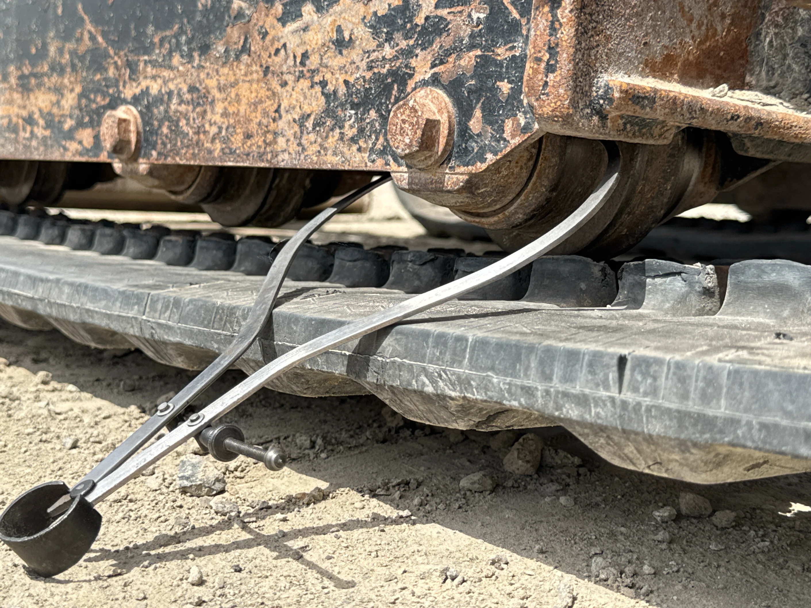 MNX-004-Cat-303E-mini-excavator-inspection-undercarriage-left-track-rollers-3