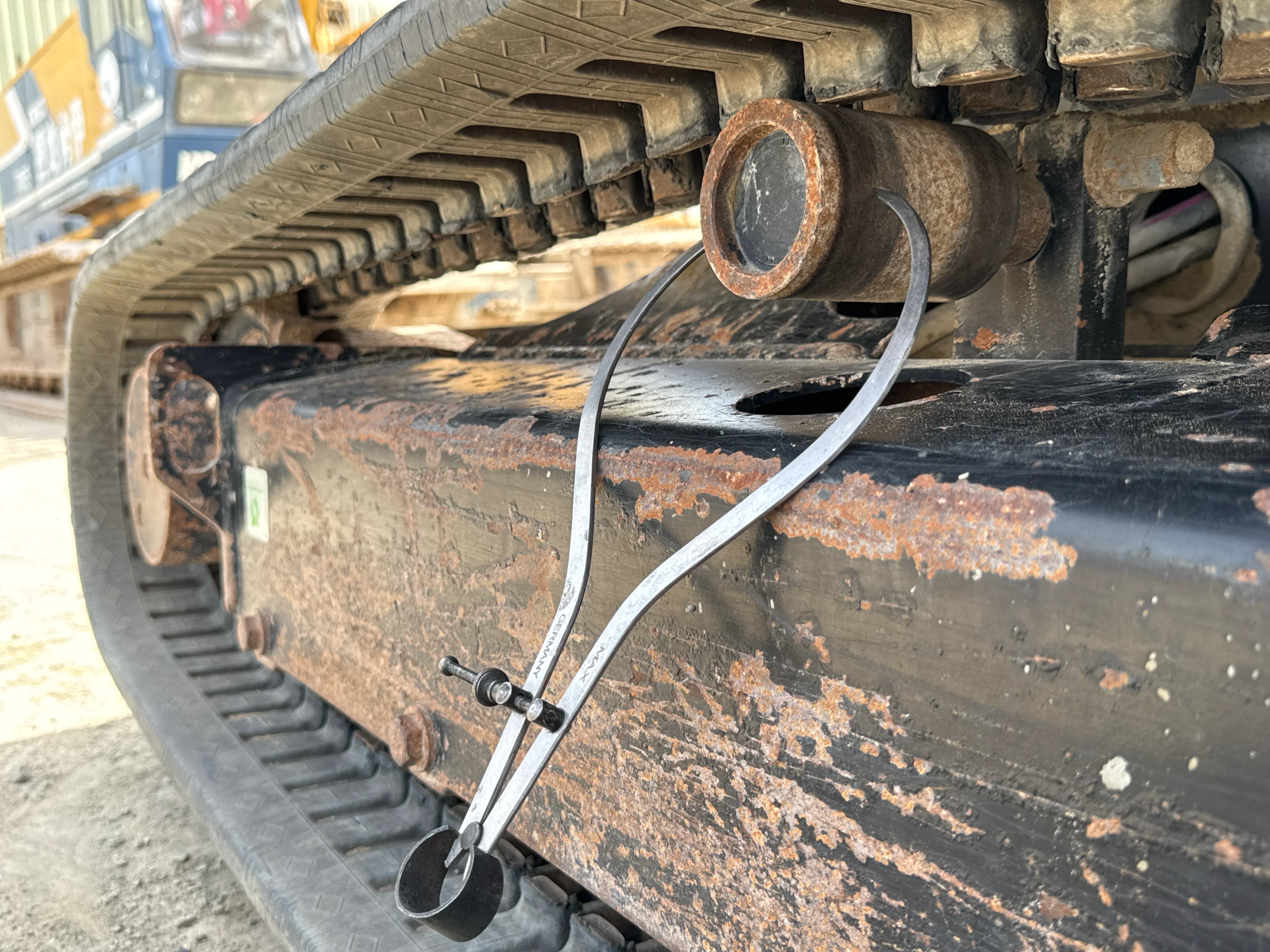 MNX-004-Cat-303E-mini-excavator-inspection-undercarriage-right-carrier-rollers-2