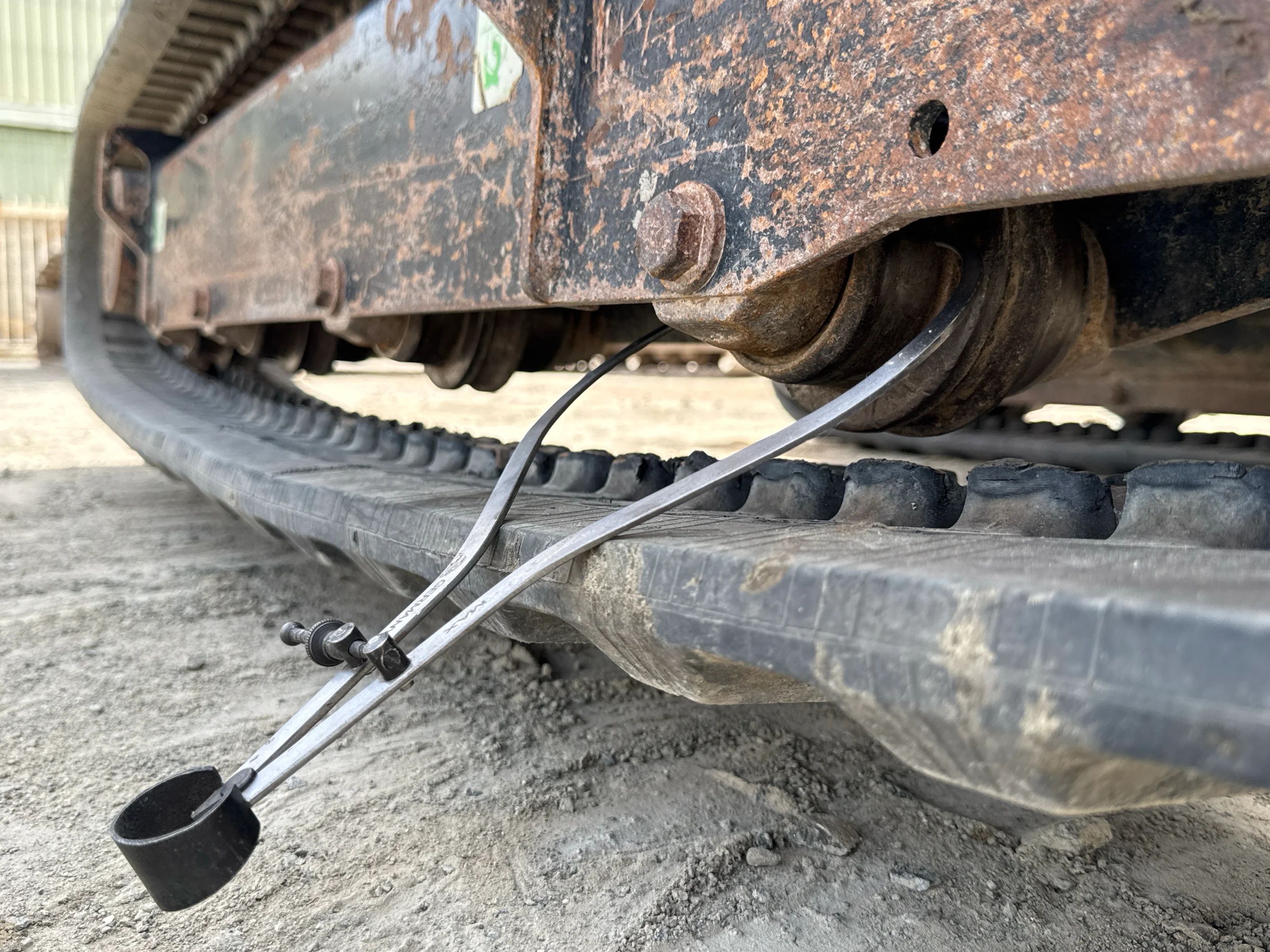MNX-004-Cat-303E-mini-excavator-inspection-undercarriage-right-track-tensioner-2