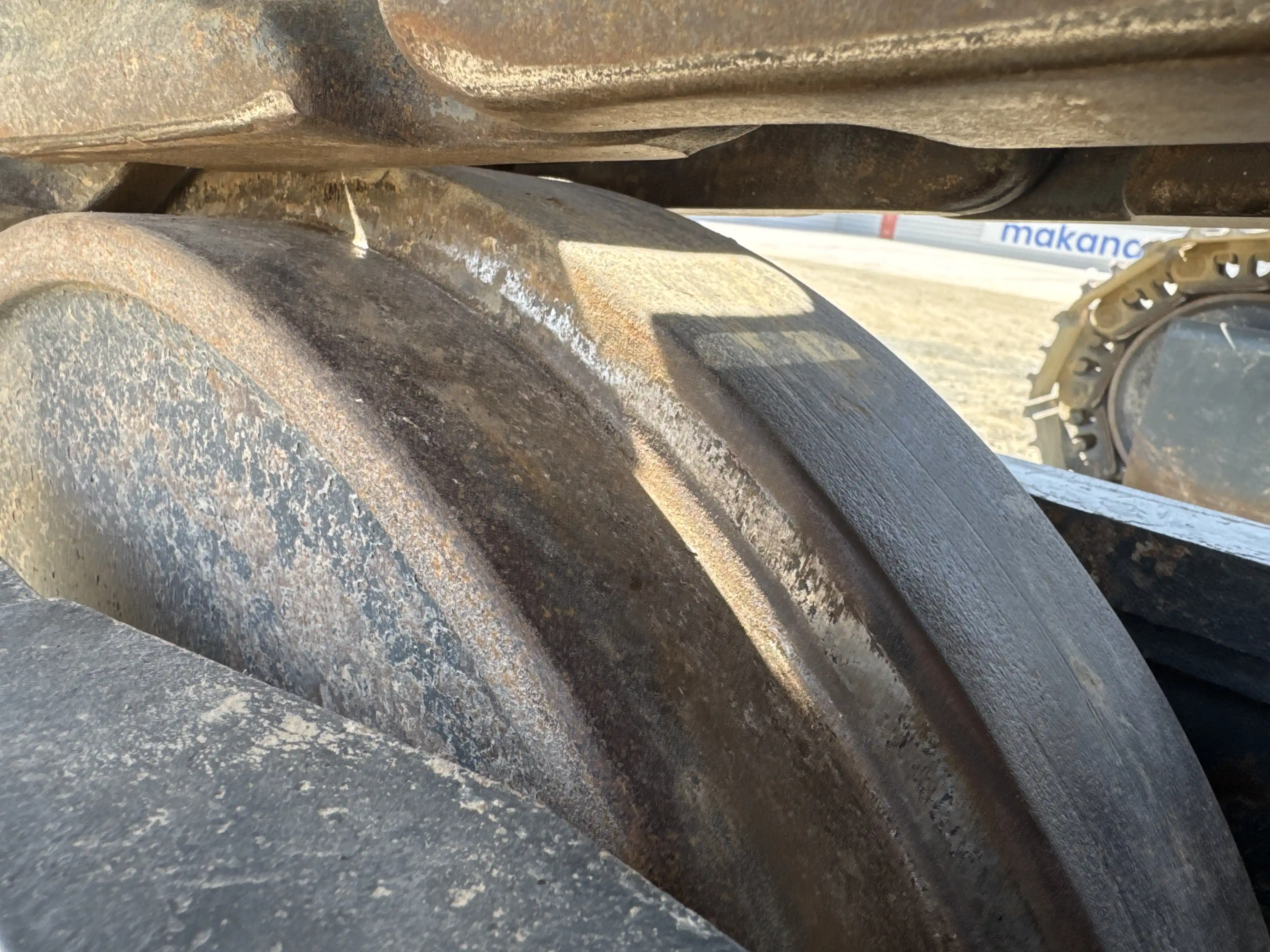 MDX-003-Kobelco-SK350LC-10-medium-excavator-inspection-undercarriage-left-idler-1