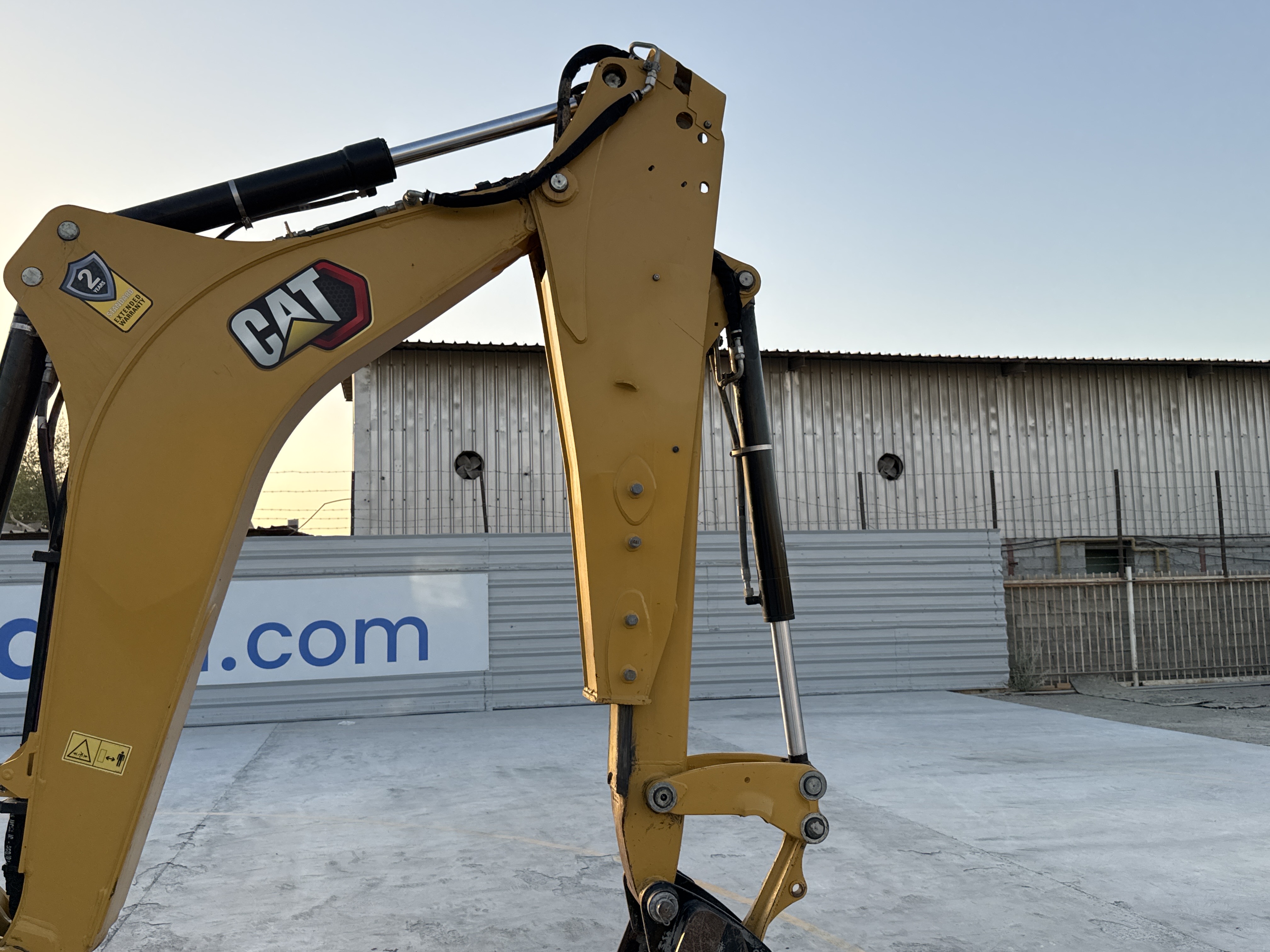 BHL-001- Cat-426F2-backhoe-loader-inspection-chassis-stick-1