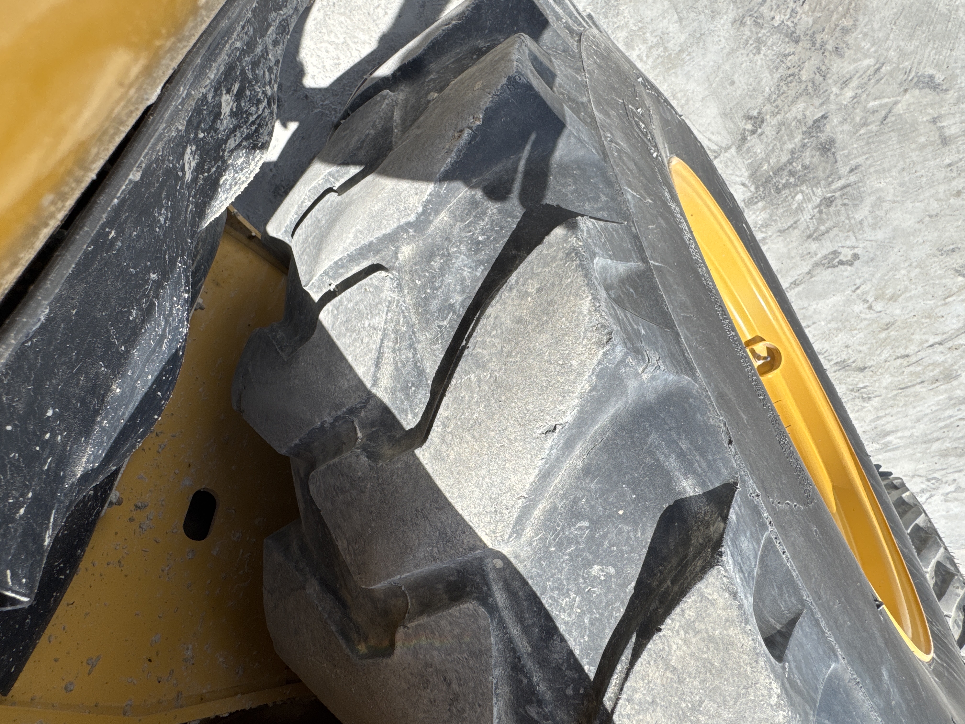 BHL-001-Cat-426F2-backhoe-loader-inspection-chassis-left-rear-tire-wheel-hub-condition-2