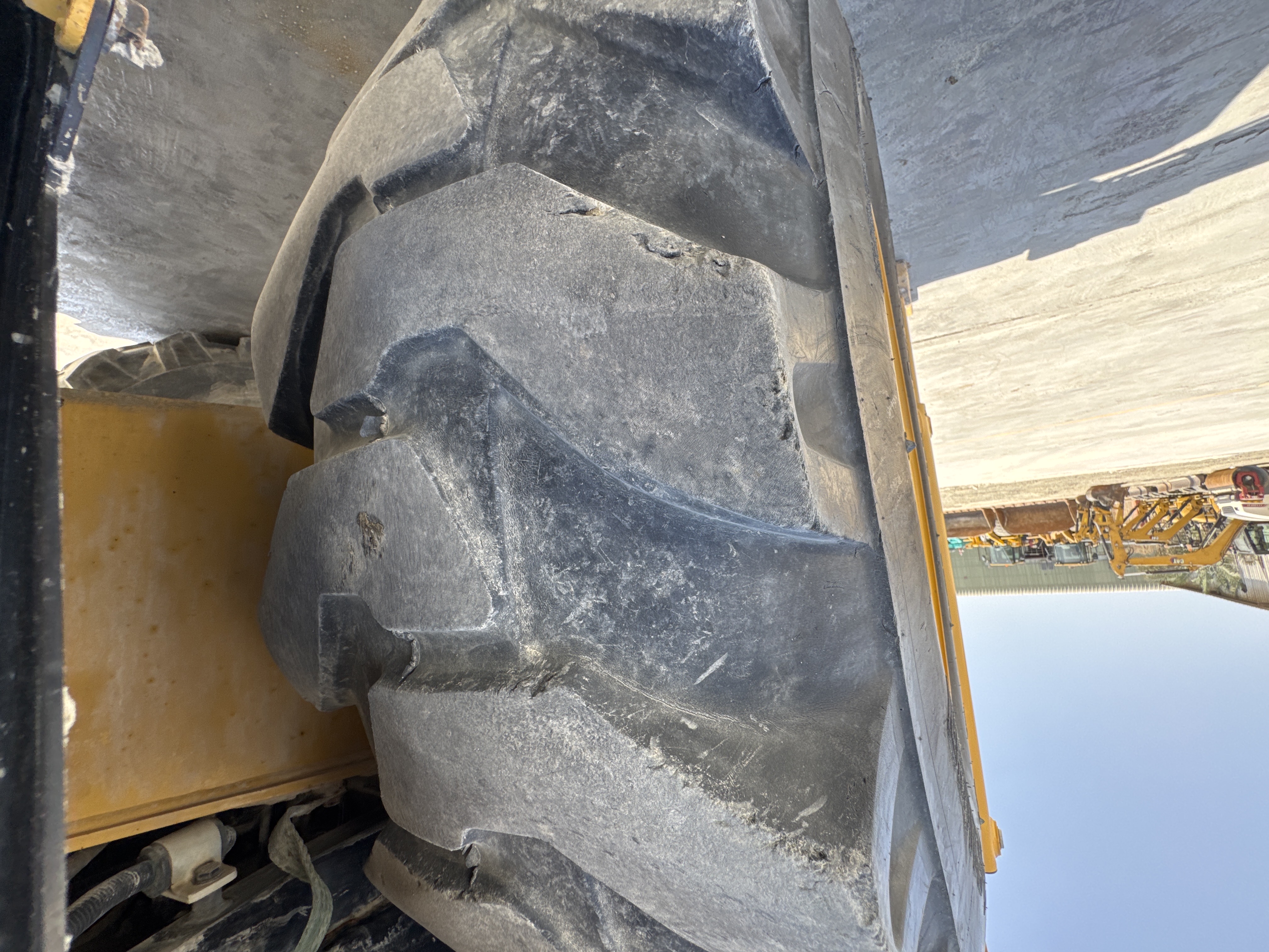BHL-001-Cat-426F2-backhoe-loader-inspection-chassis-right-rear-tire-wheel-hub-condition-2