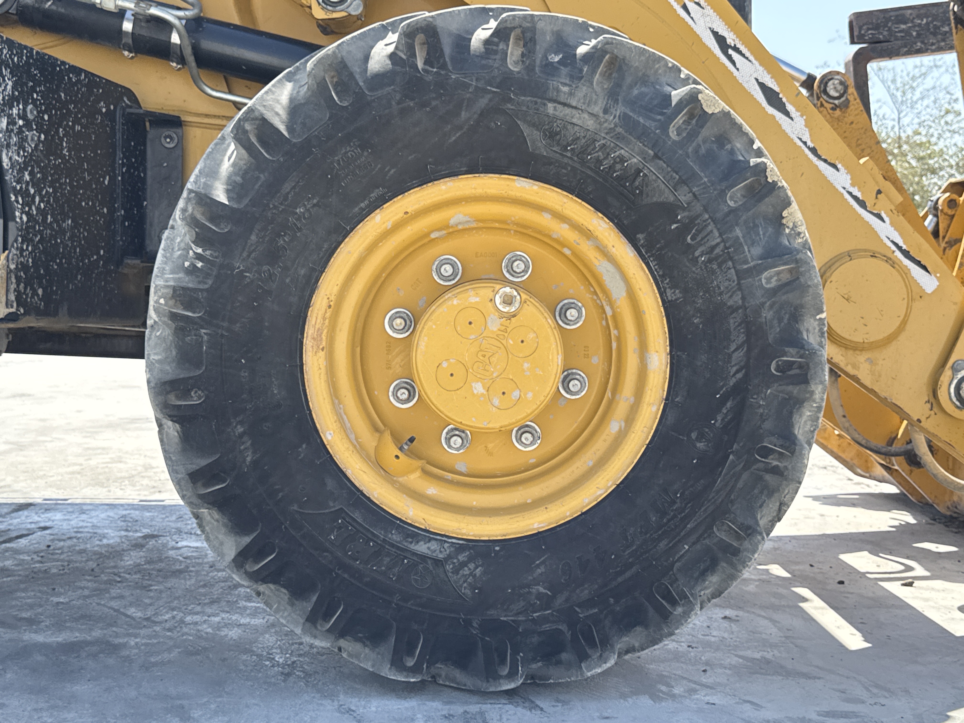 BHL-001-Cat-426F2-backhoe-loader-inspection-chassis-right-front-tire-wheel-hub-condition-1