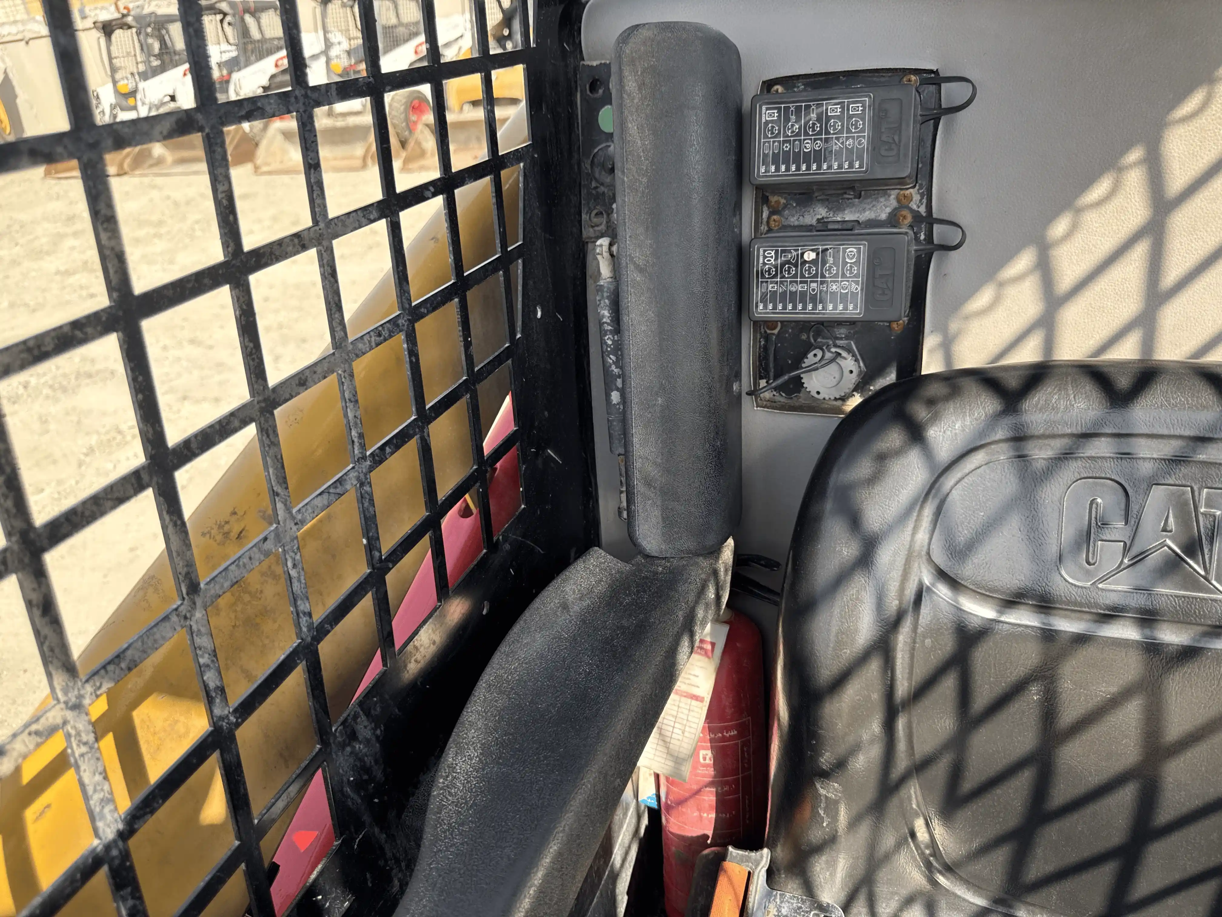 SSL-004-Cat-226B3-skid-steer-loader-inspection-cabin-seats-armrests-2