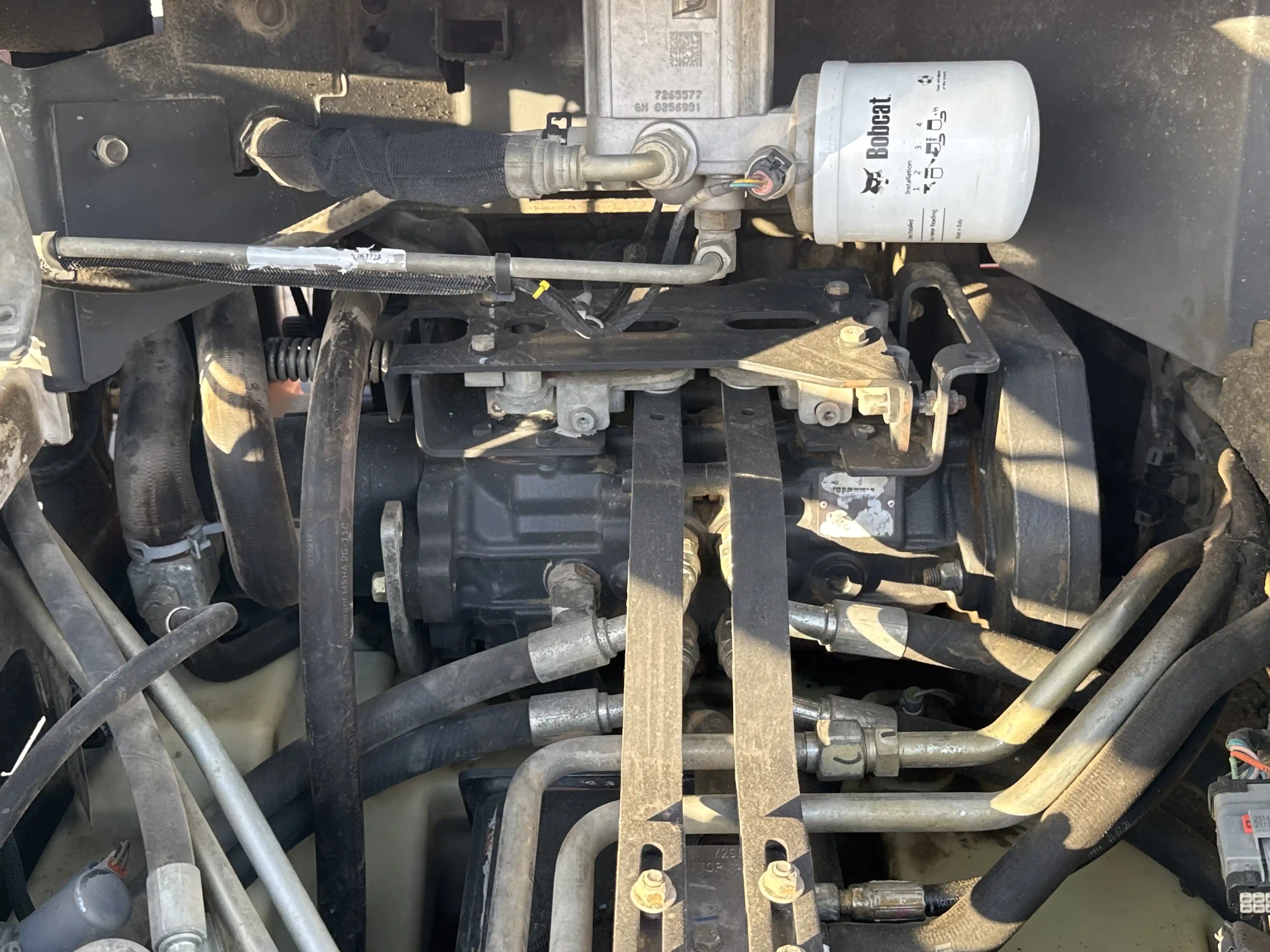 SSL-006-Bobcat-S510-skid-steer-loader-inspection-hydraulics-hydraulic-pump-2