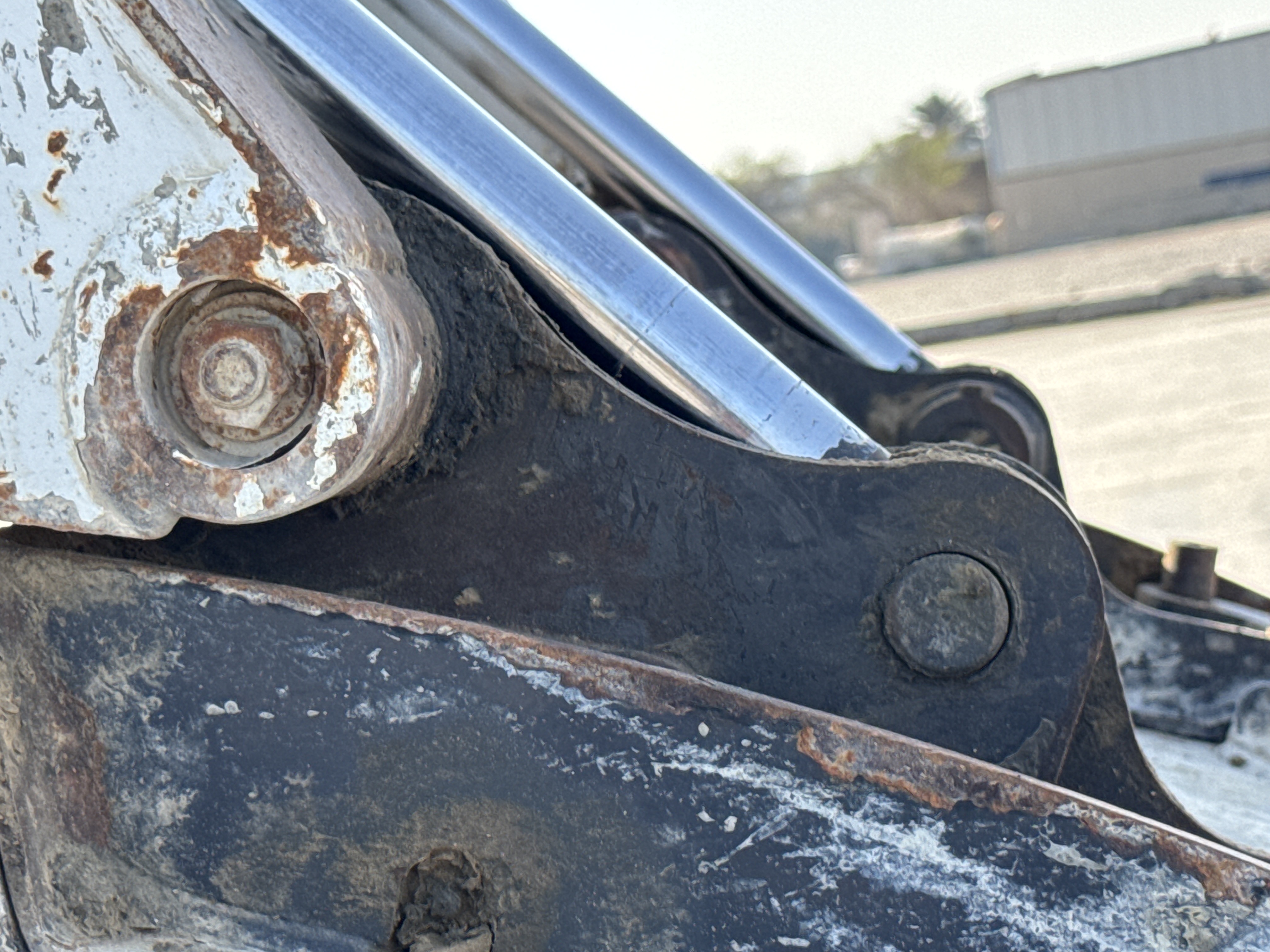 SSL-009-Bobcat-S510-skid-steer-loader-inspection-chassis-pins-and-bushings-lift-arm-to-bucket-1