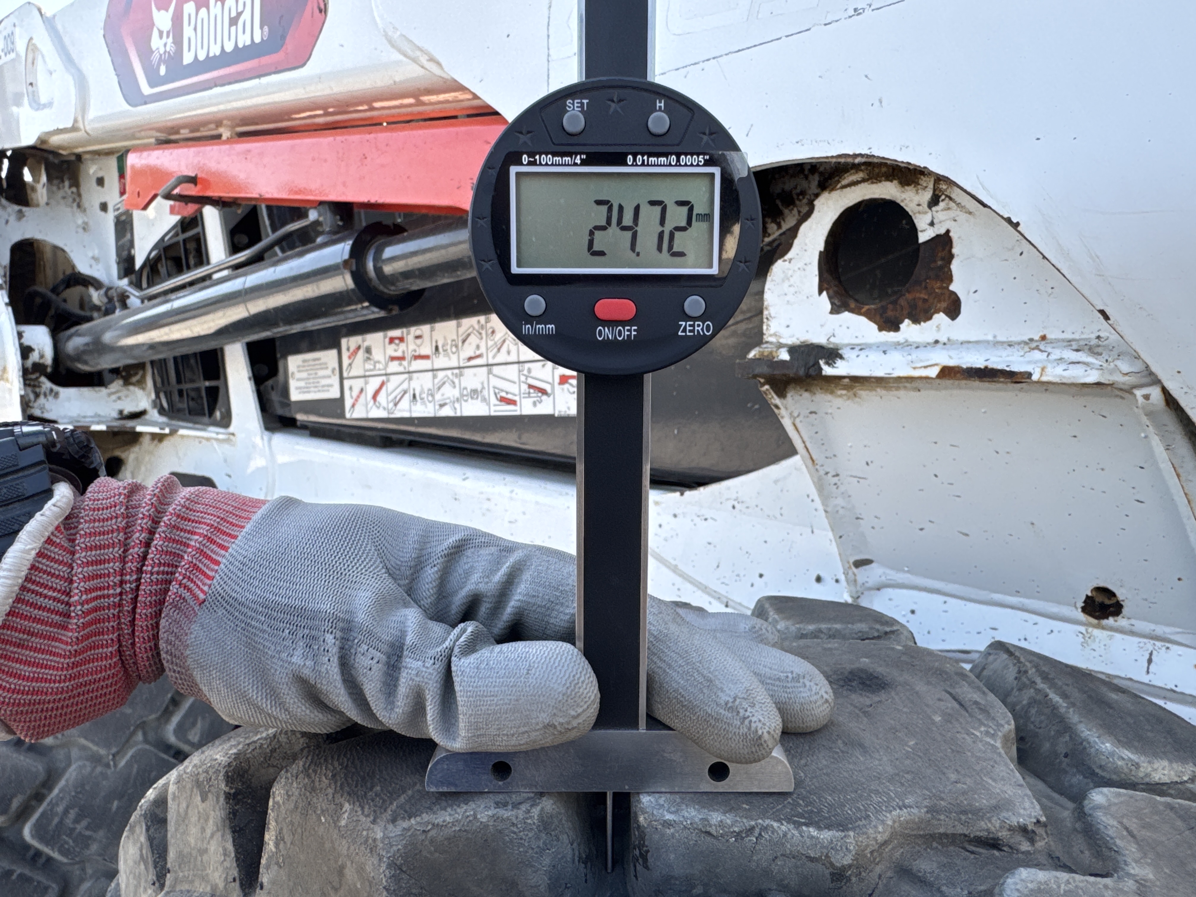 SSL-009-Bobcat-S510-skid-steer-loader-inspection-chassis-right-front-tire-tread-depth