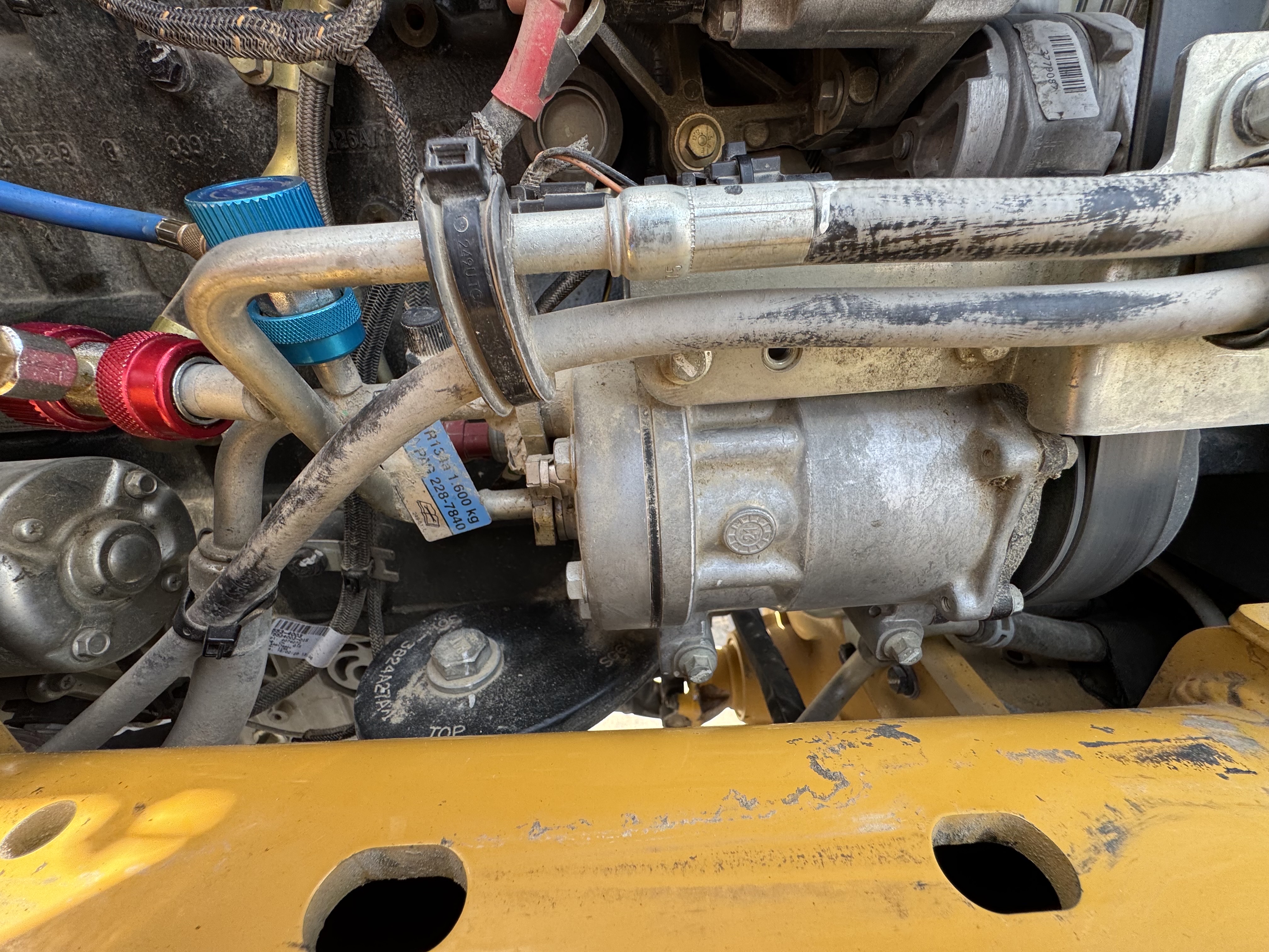 BHL-002- Cat-428-backhoe-loader-inspection-air-conditioning-AC-compressor-2