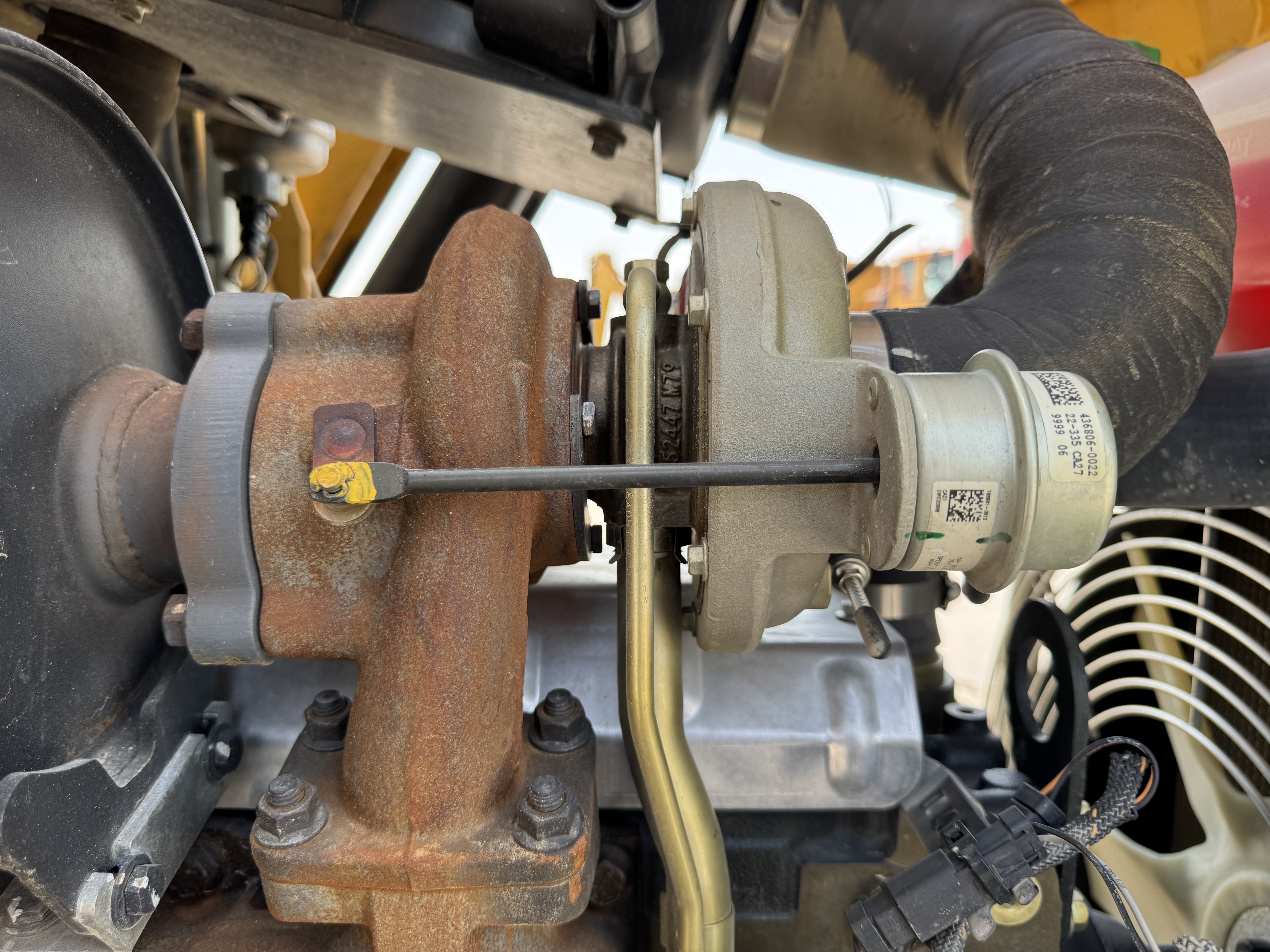BHL-002- Cat-428-backhoe-loader-inspection-engine-turbo-2