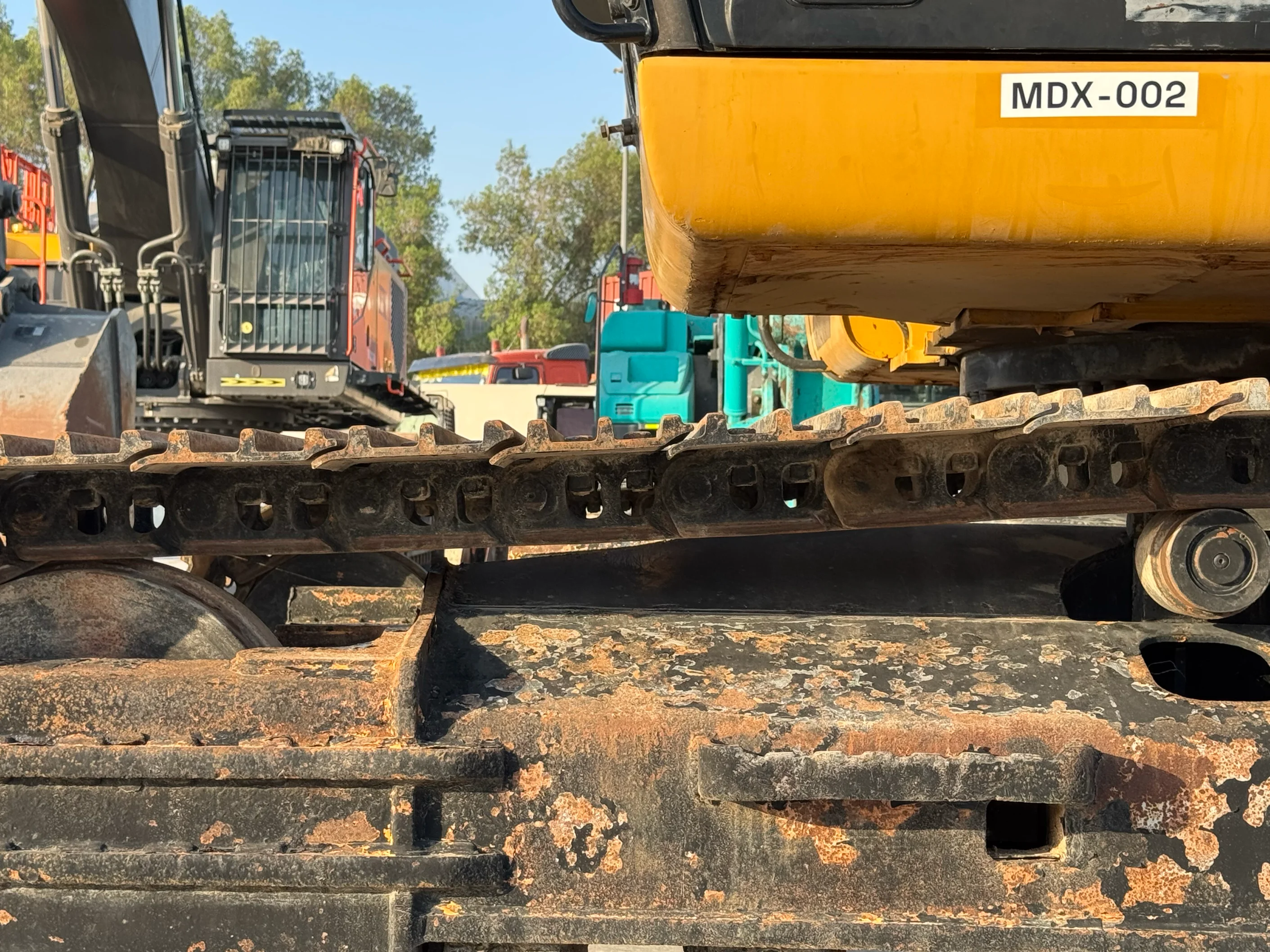 MDX-002-Cat-323D3-medium-excavator-inspection-undercarriage-left-track-tensioner-1