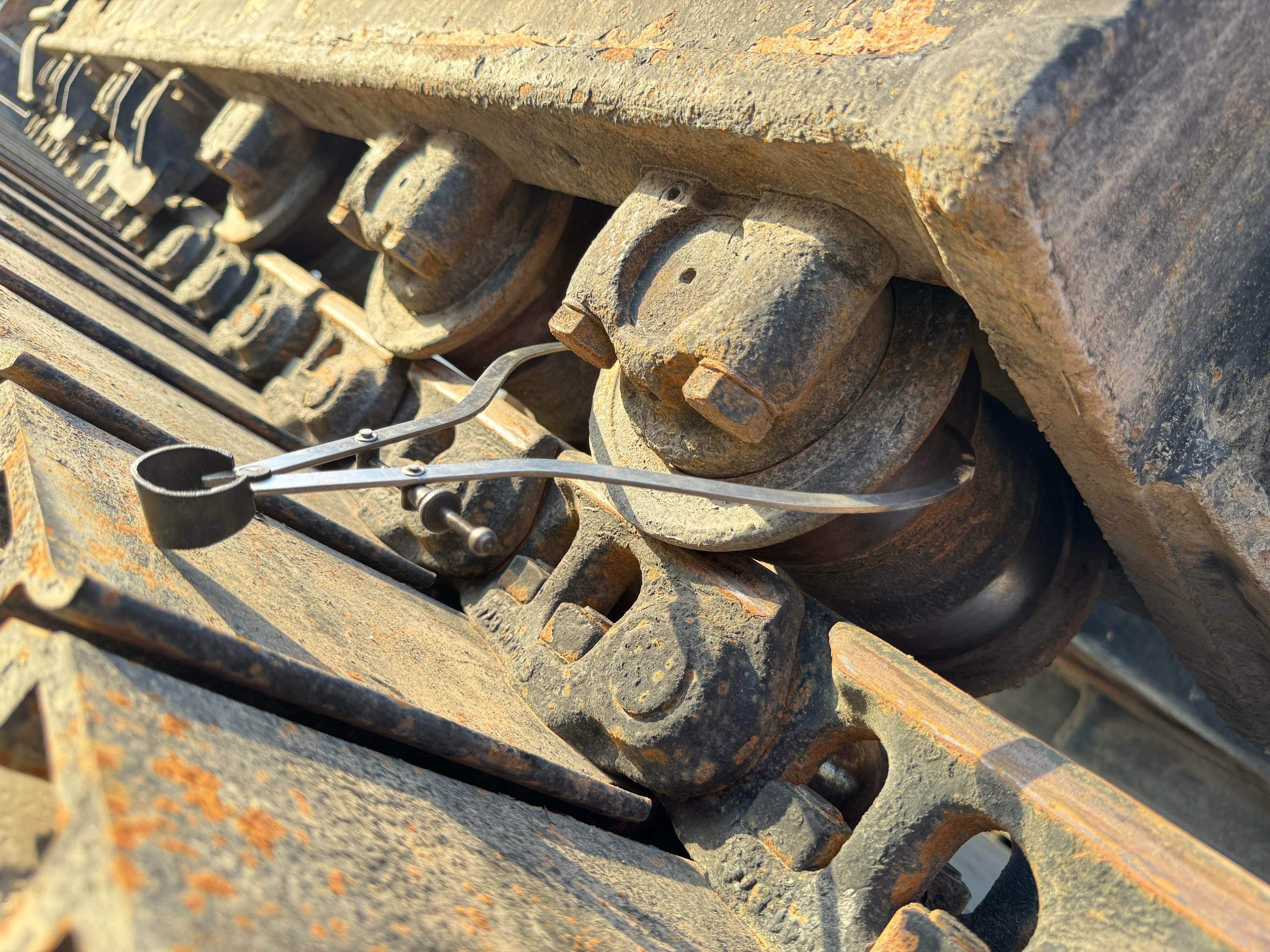 MDX-002-Cat-323D3-medium-excavator-inspection-undercarriage-left-track-rollers-5