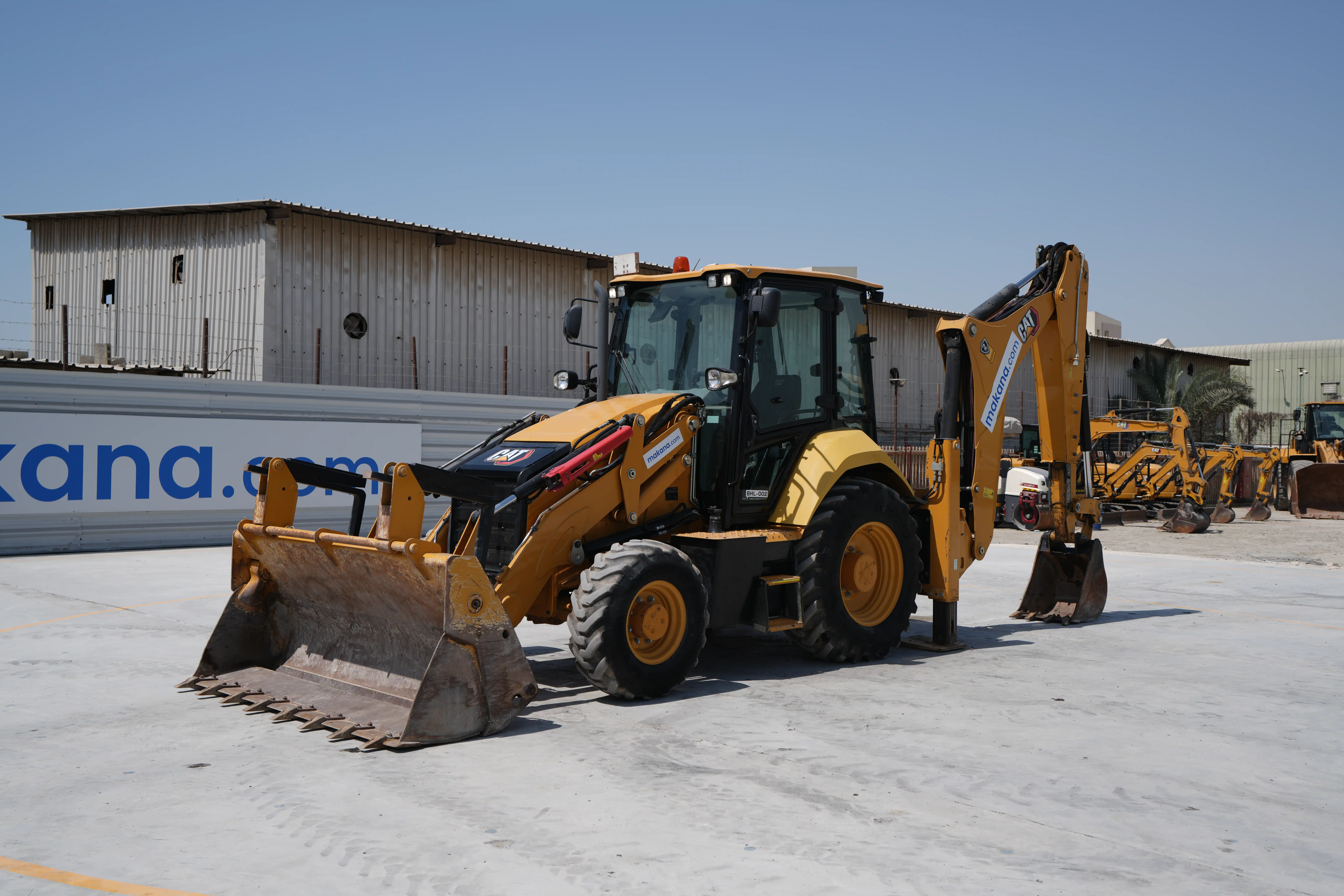 BHL-2-cat-428-backhoe-loader-exterior-front-left