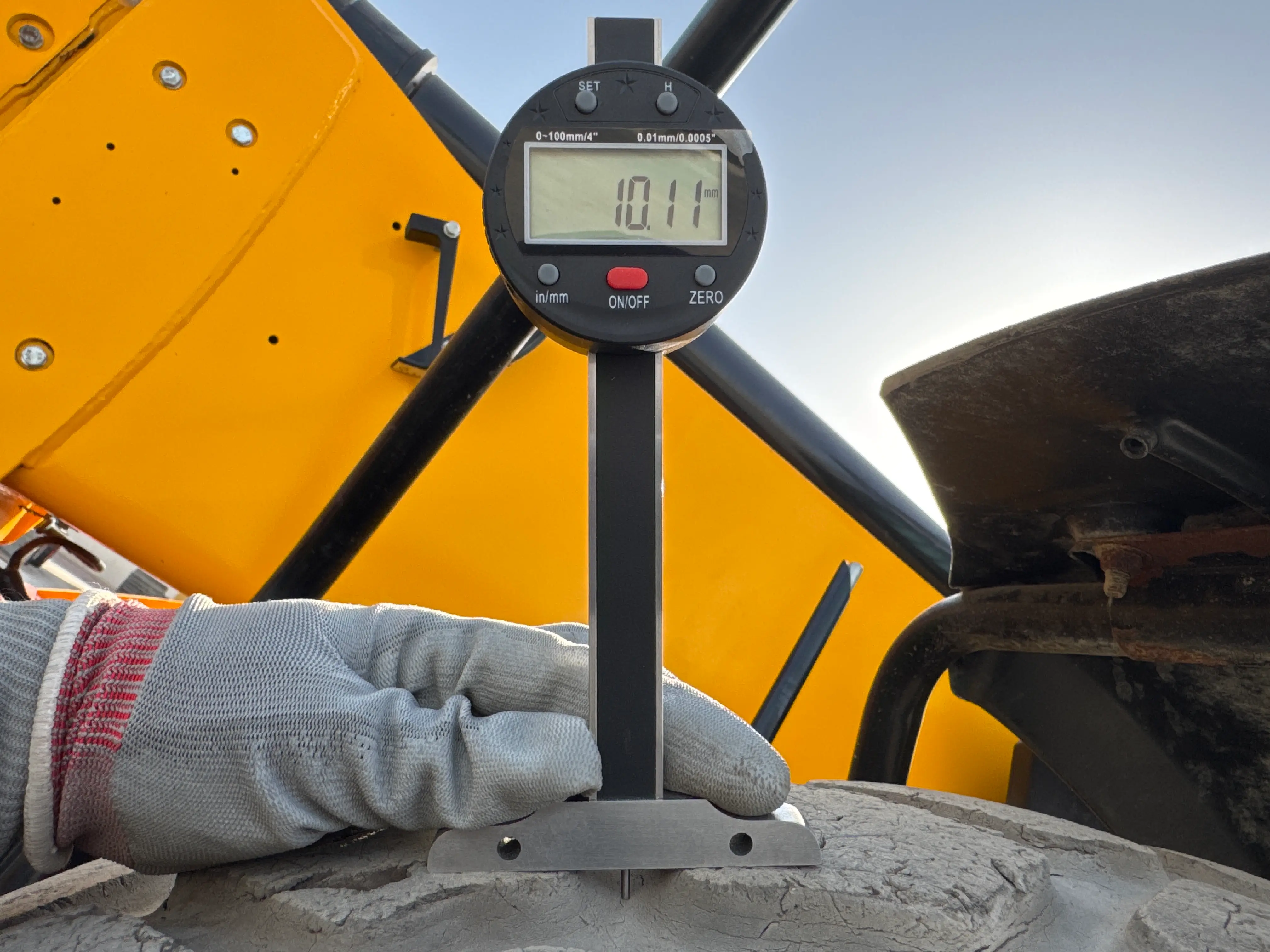 THM-001-JCB-540-170-telehandler-inspection-chassis-left-front-tire-tread-depth