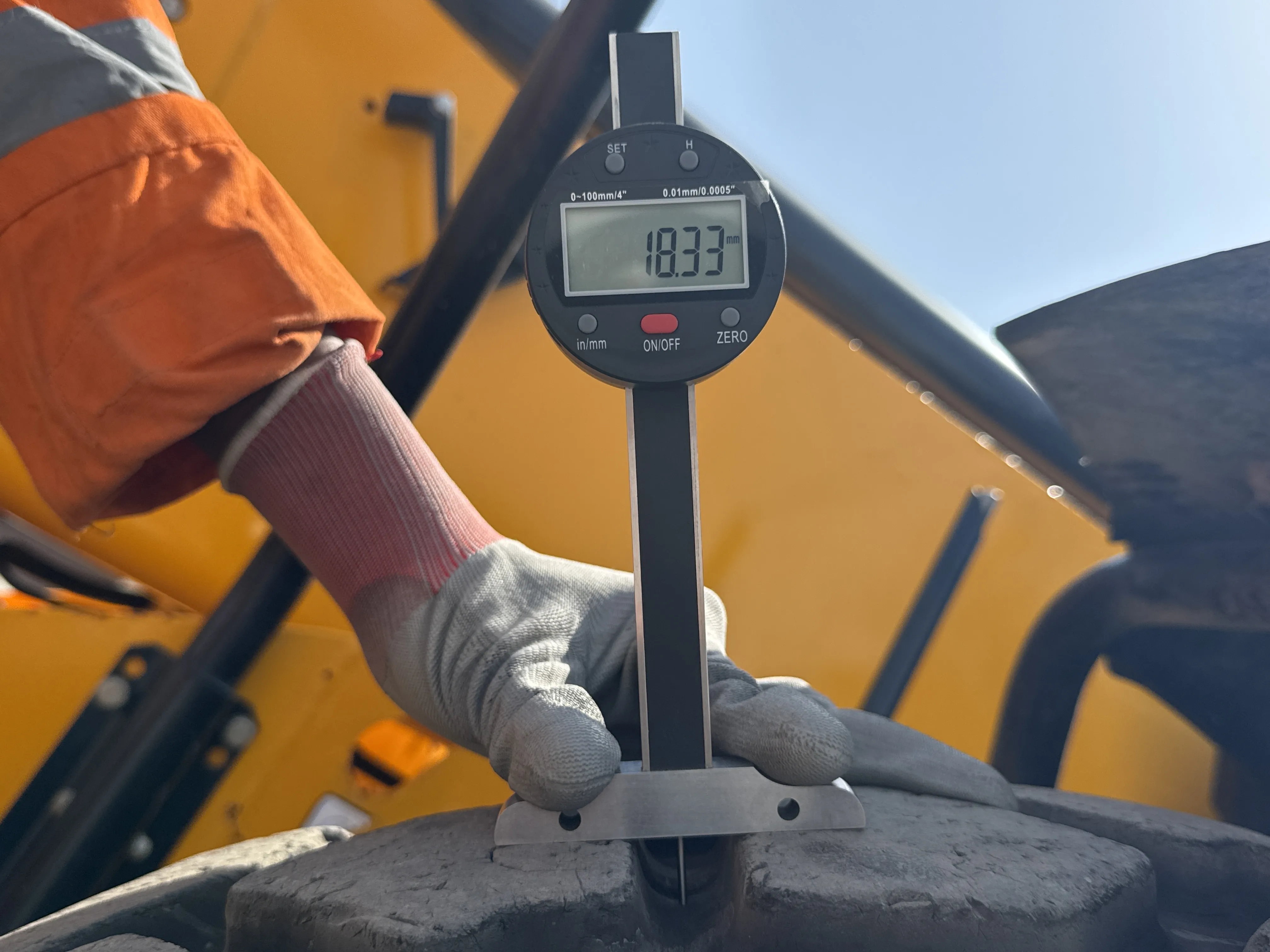 THM-002-JCB-540-170-telehandler-inspection-chassis-left-front-tire-tread-depth-1