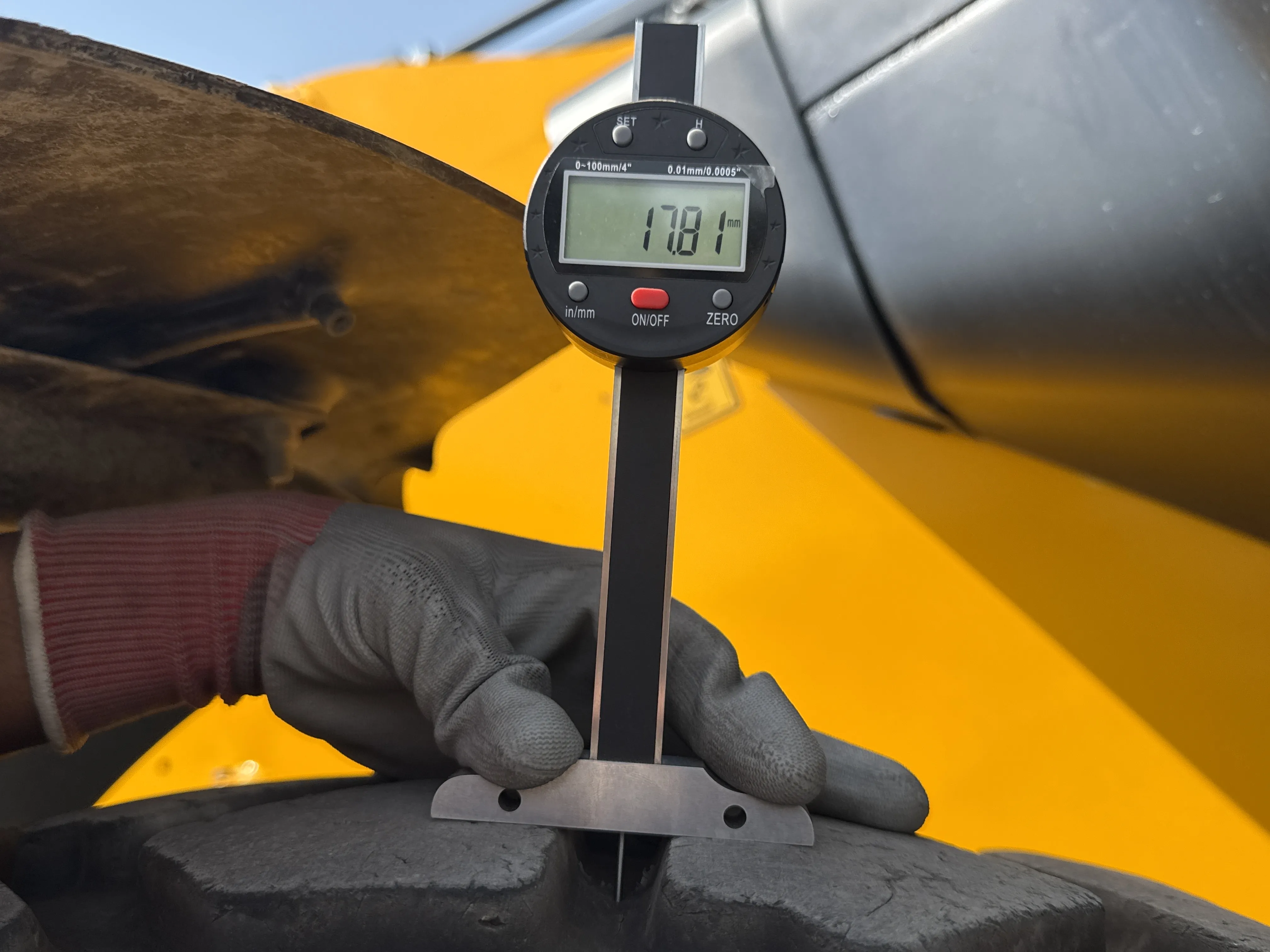 THM-002-JCB-540-170-telehandler-inspection-chassis-right-rear-tire-tread-depth-1