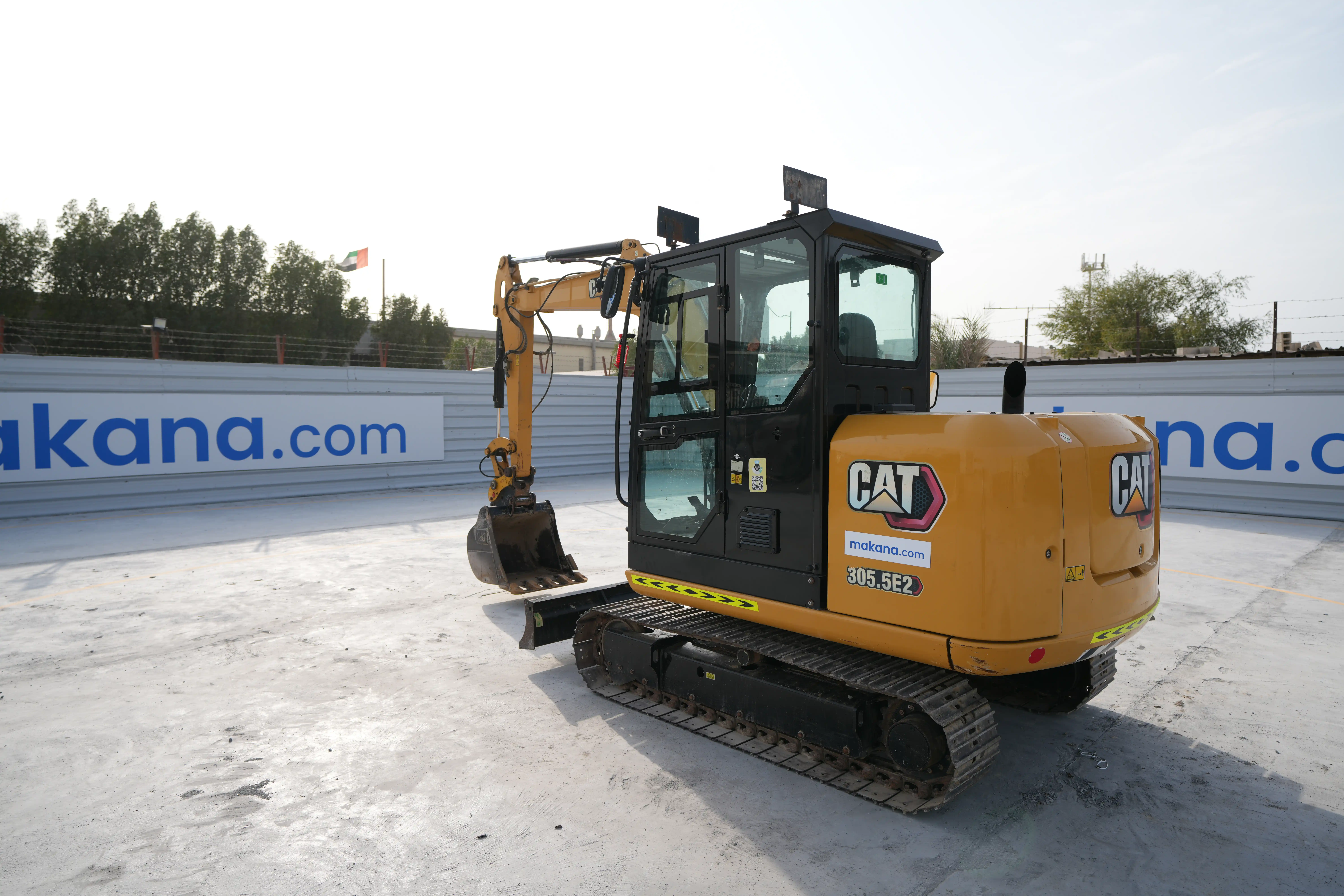 MNX-3-cat-305.5E2-mini-excavator-exterior-rear-left
