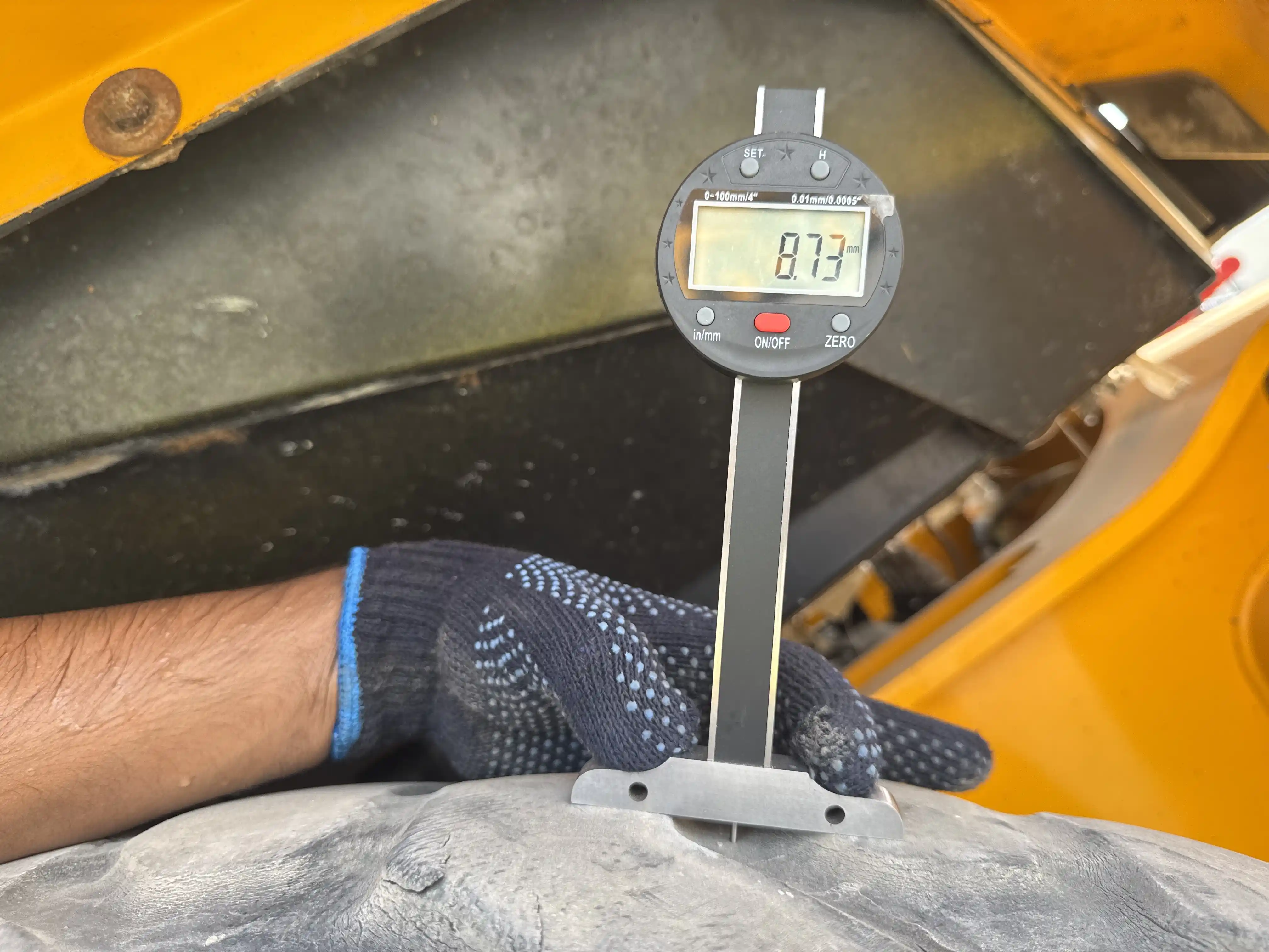 BHL-004-JCB-3DX-Plus-backhoe-loader-inspection-chassis-left-rear-tire-tread-depth
