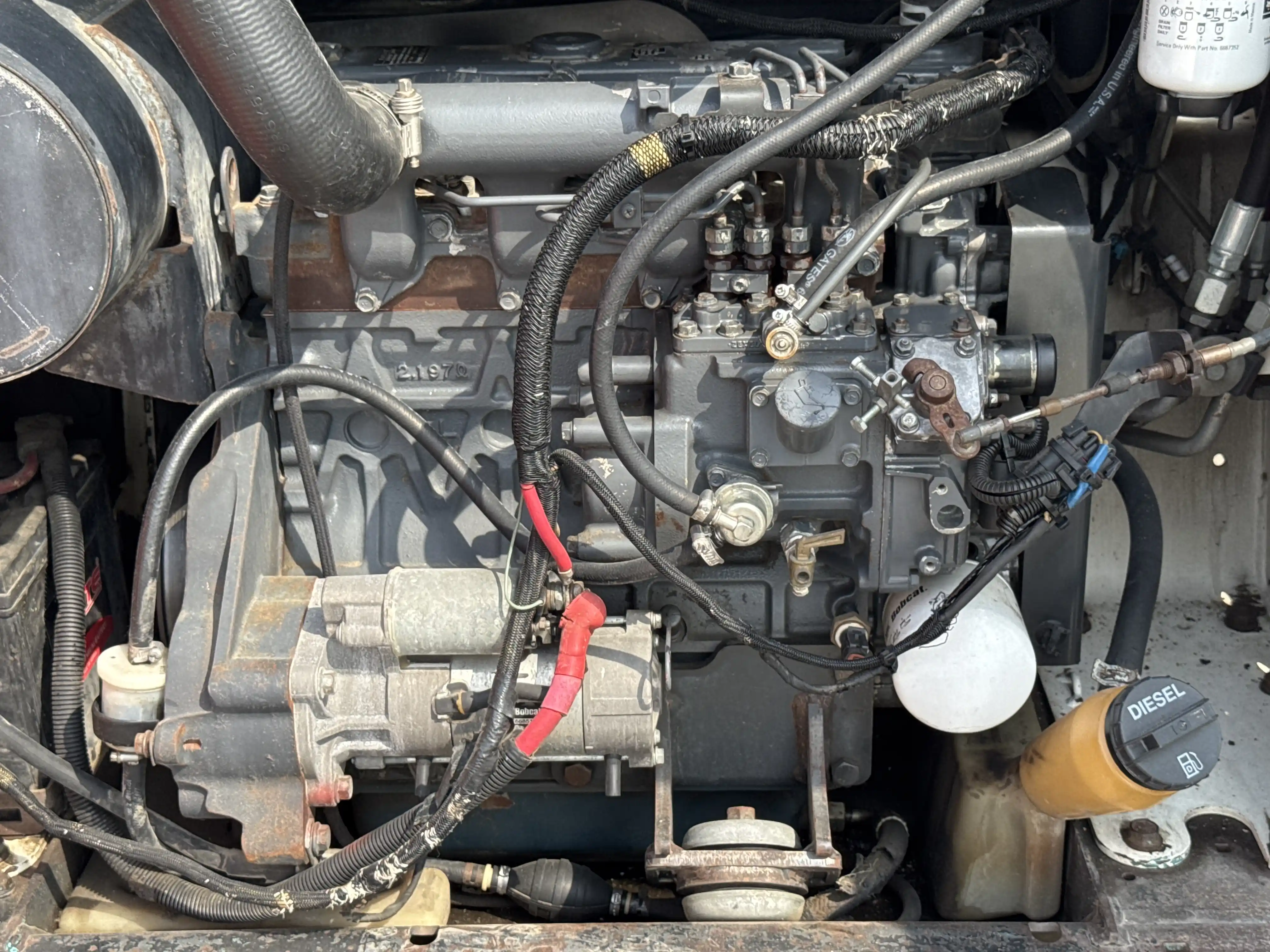 SSL-010-Bobcat-S450-skid-steer-loader-inspection-engine-engine-oil-leaks