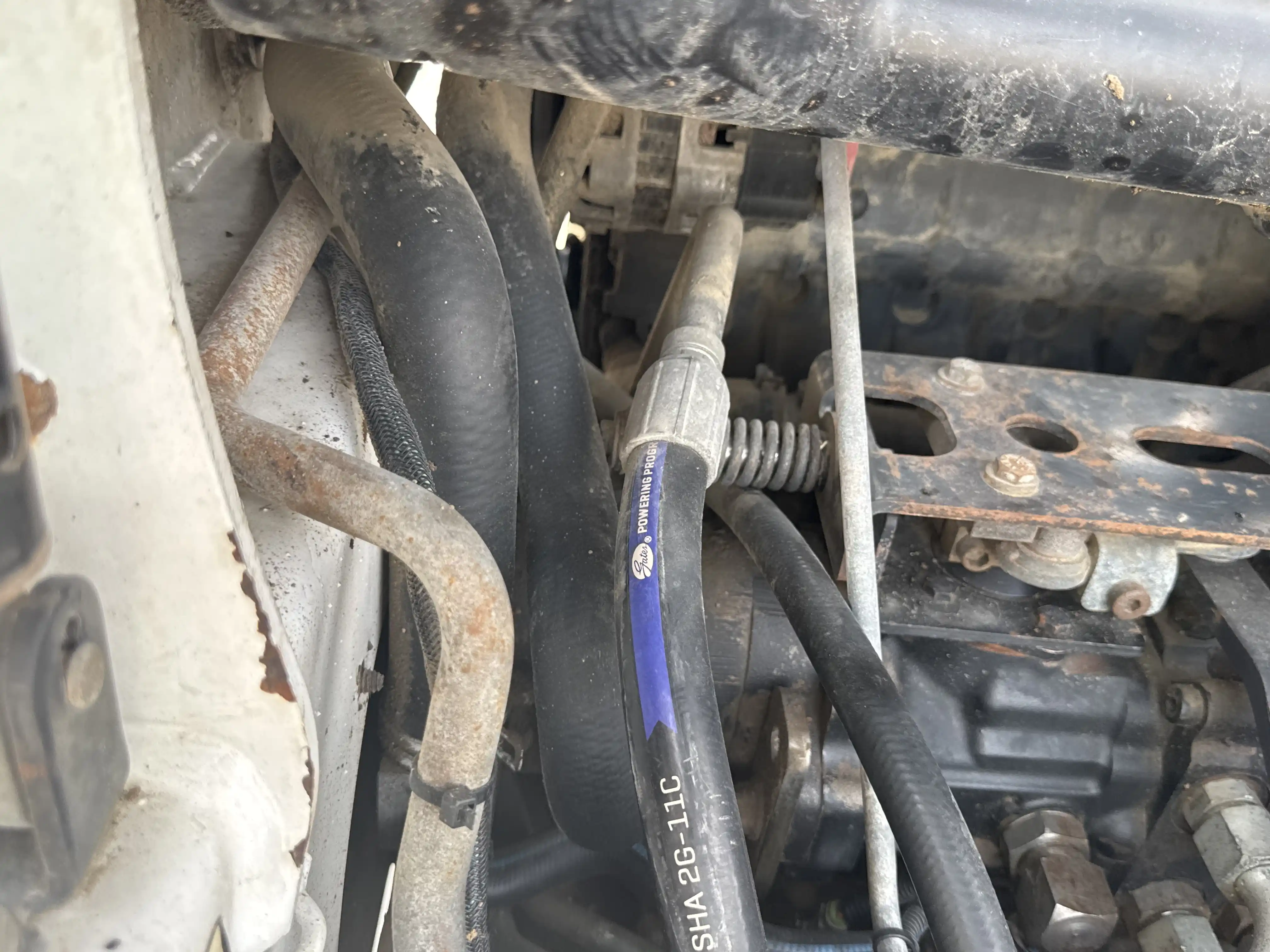 SSL-010-Bobcat-S450-skid-steer-loader-inspection-hydraulics-hydraulic-hoses-and-lines
