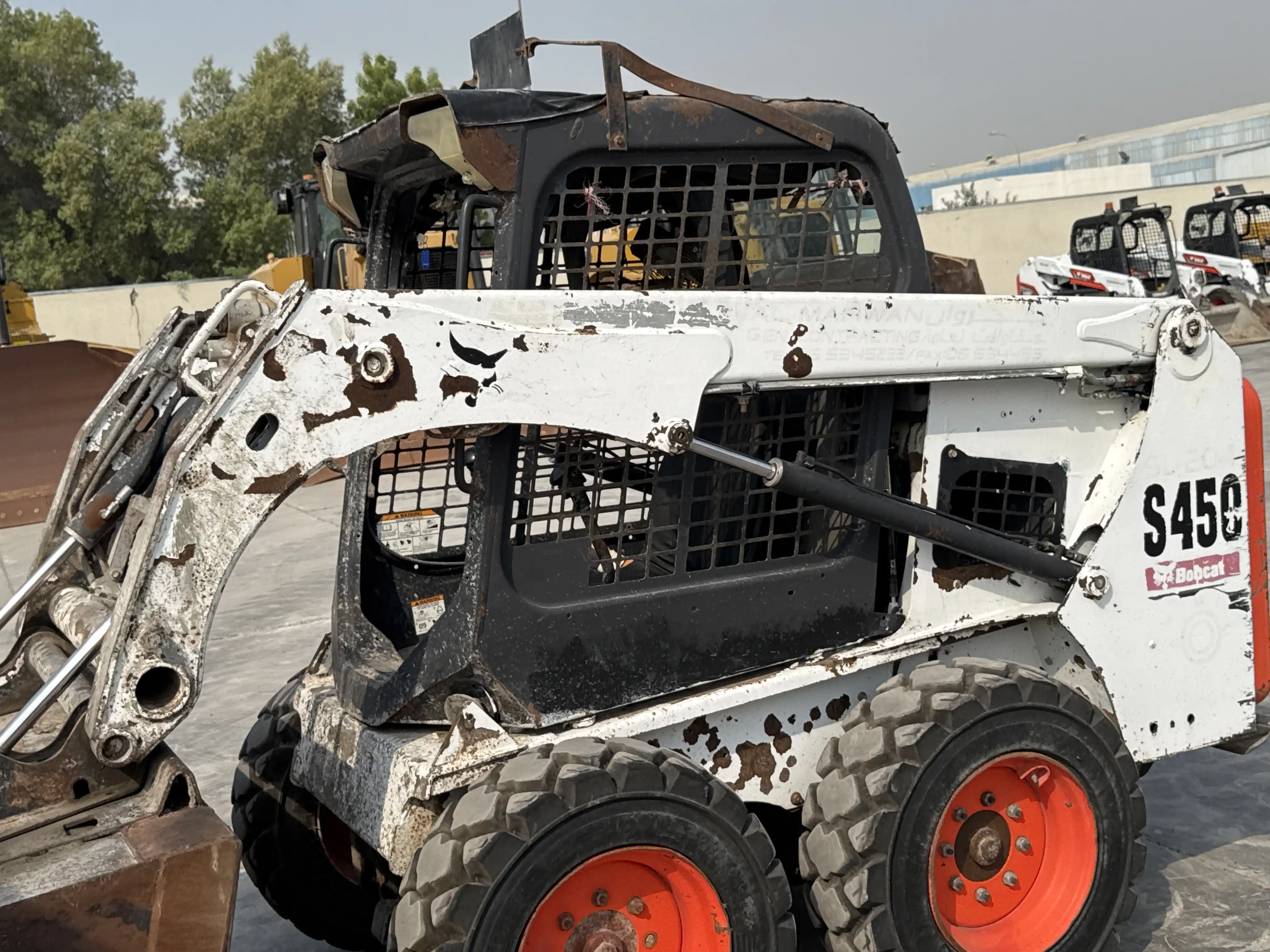 SSL-010-Bobcat-S450-skid-steer-loader-inspection-hydraulics-lift-arm