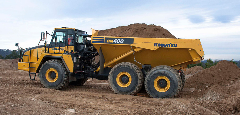 Which haul truck carries more? Comparing Komatsu HM400, Cat 777, Volvo A40G