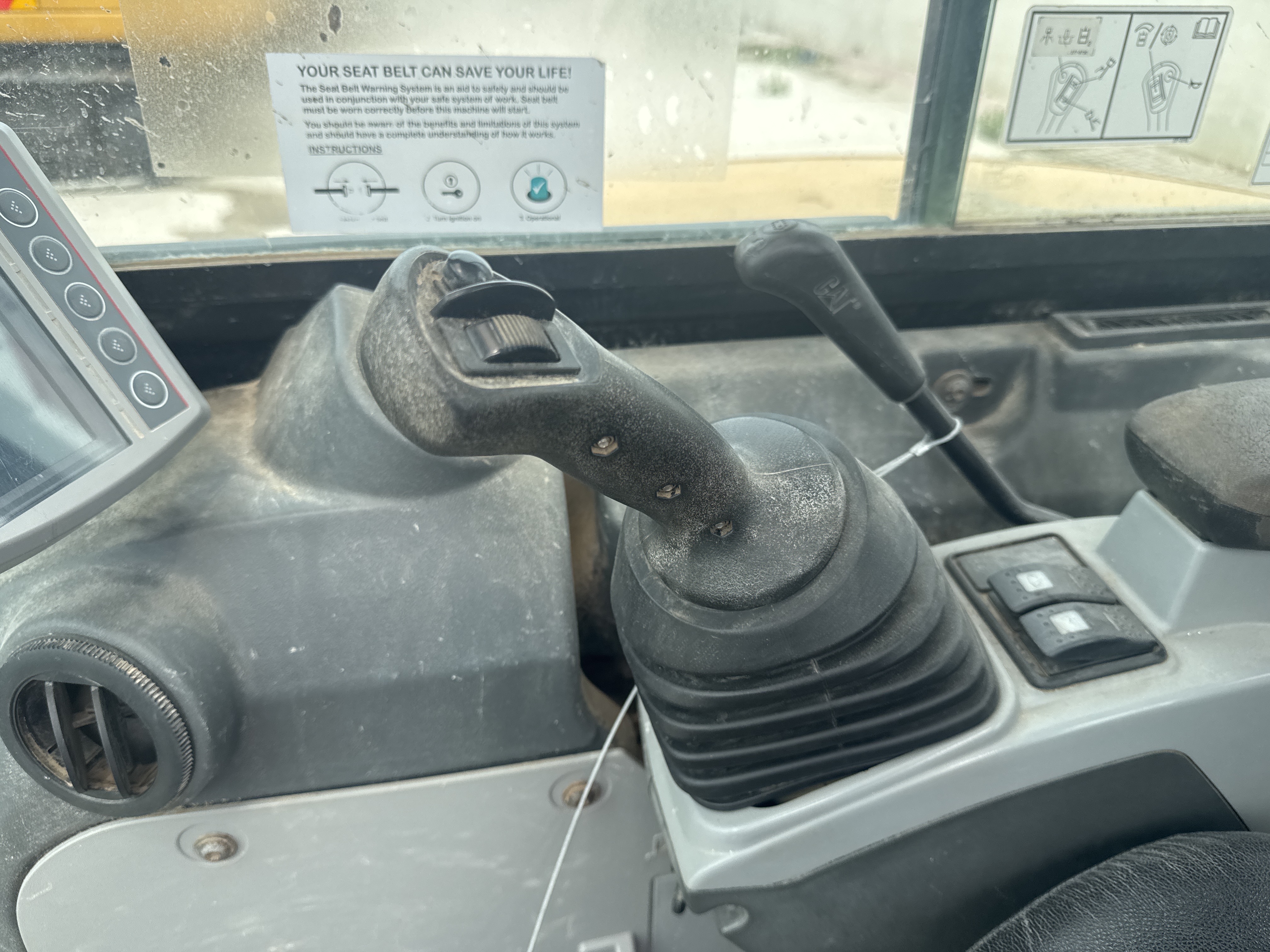 MNX-021-Cat-305E2-Mini-excavators-inspection-Cabin-Joysticks-1