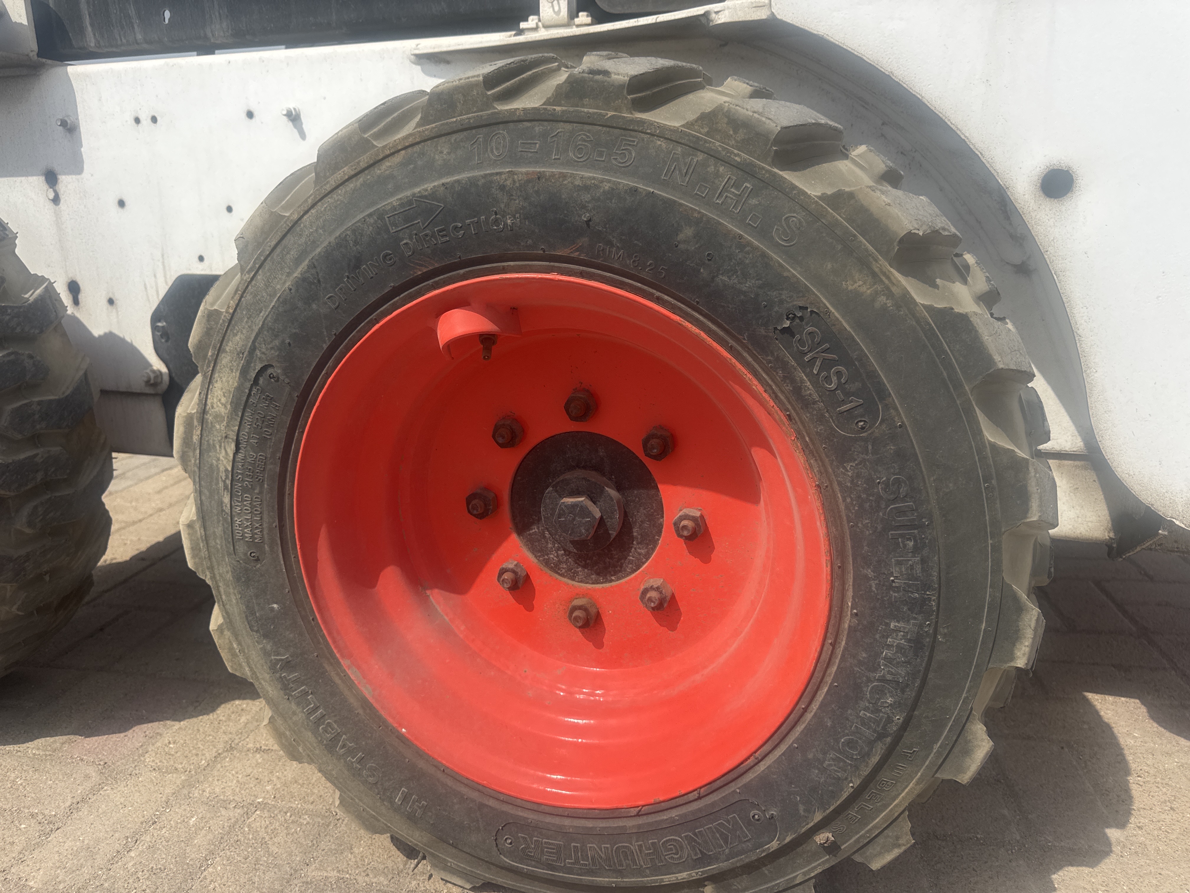 SSL-019-بوبكات-S150-لوادر-انزلاقية-بعجلات-فحص-الهيكل-الإطار-الخلفي-الأيسر-/-محور-العجلة---الحالة-1